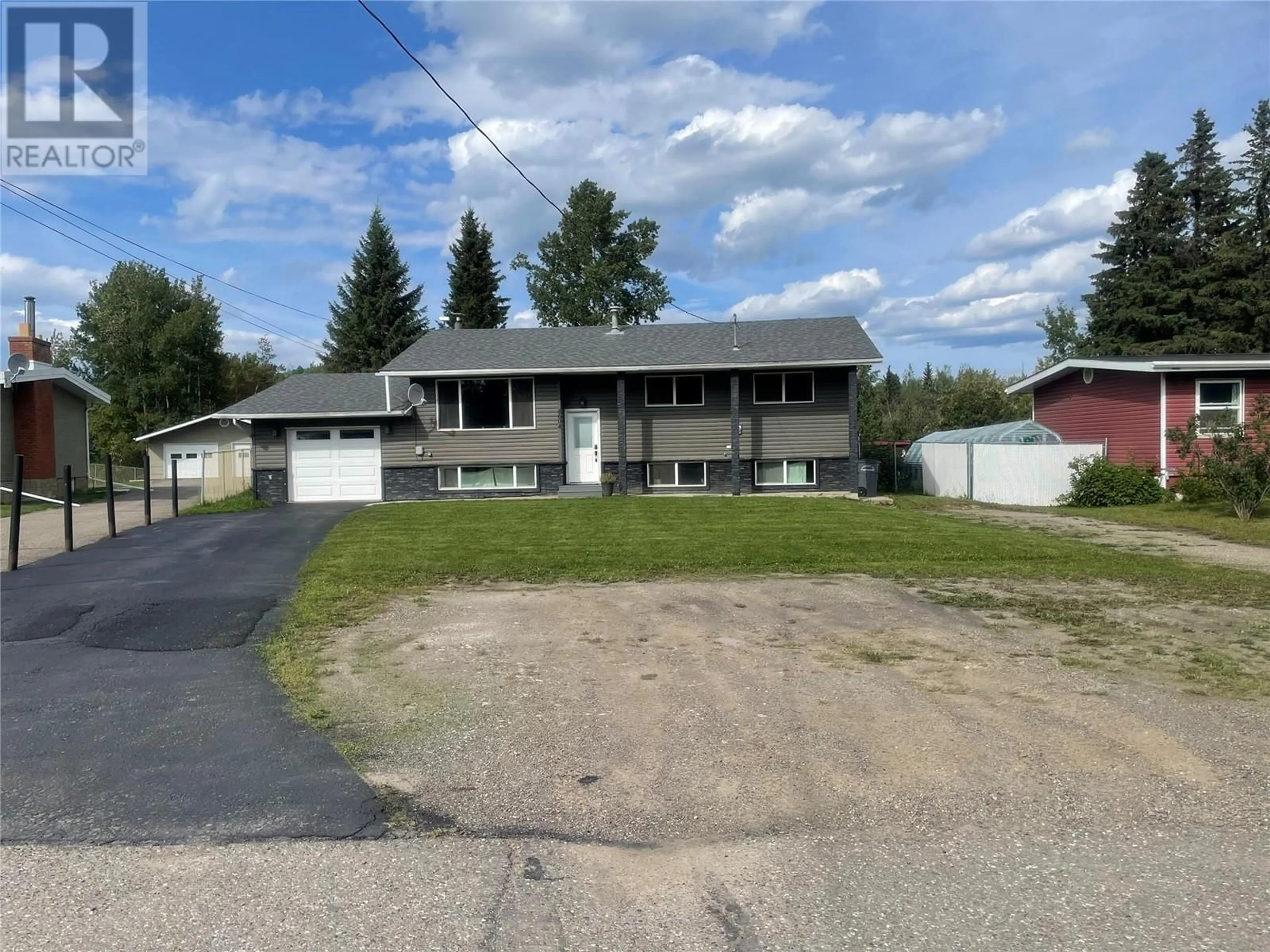 A pic from outside/outdoor area/front of a property/back of a property/a pic from drone, street for 4604 49 NE Avenue, Chetwynd British Columbia V0C1J0