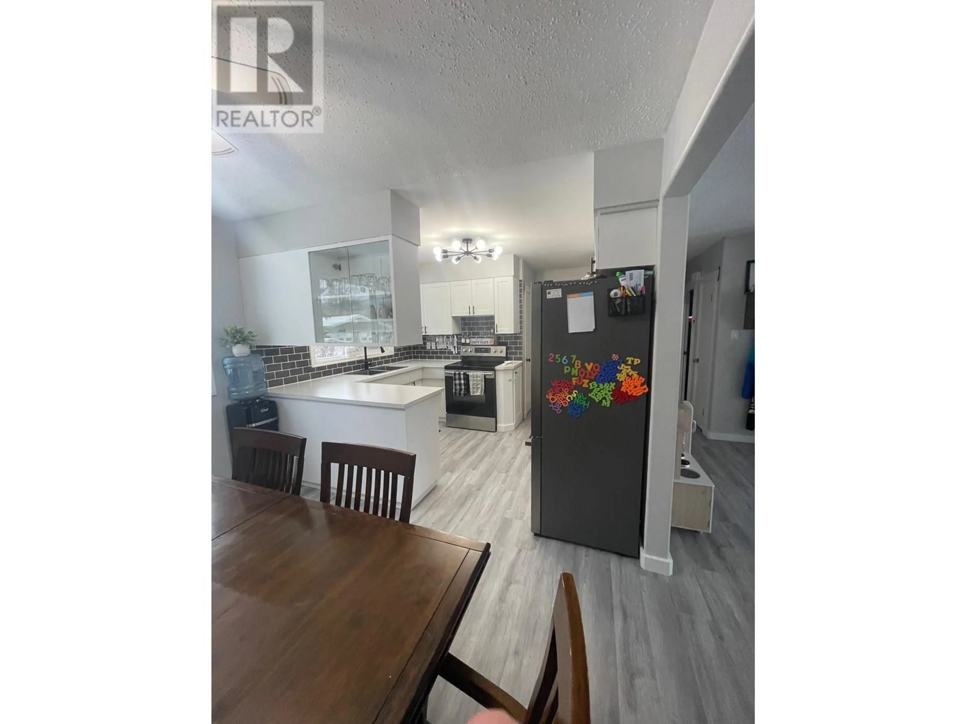 Open concept kitchen, unknown for 4604 49 NE Avenue, Chetwynd British Columbia V0C1J0