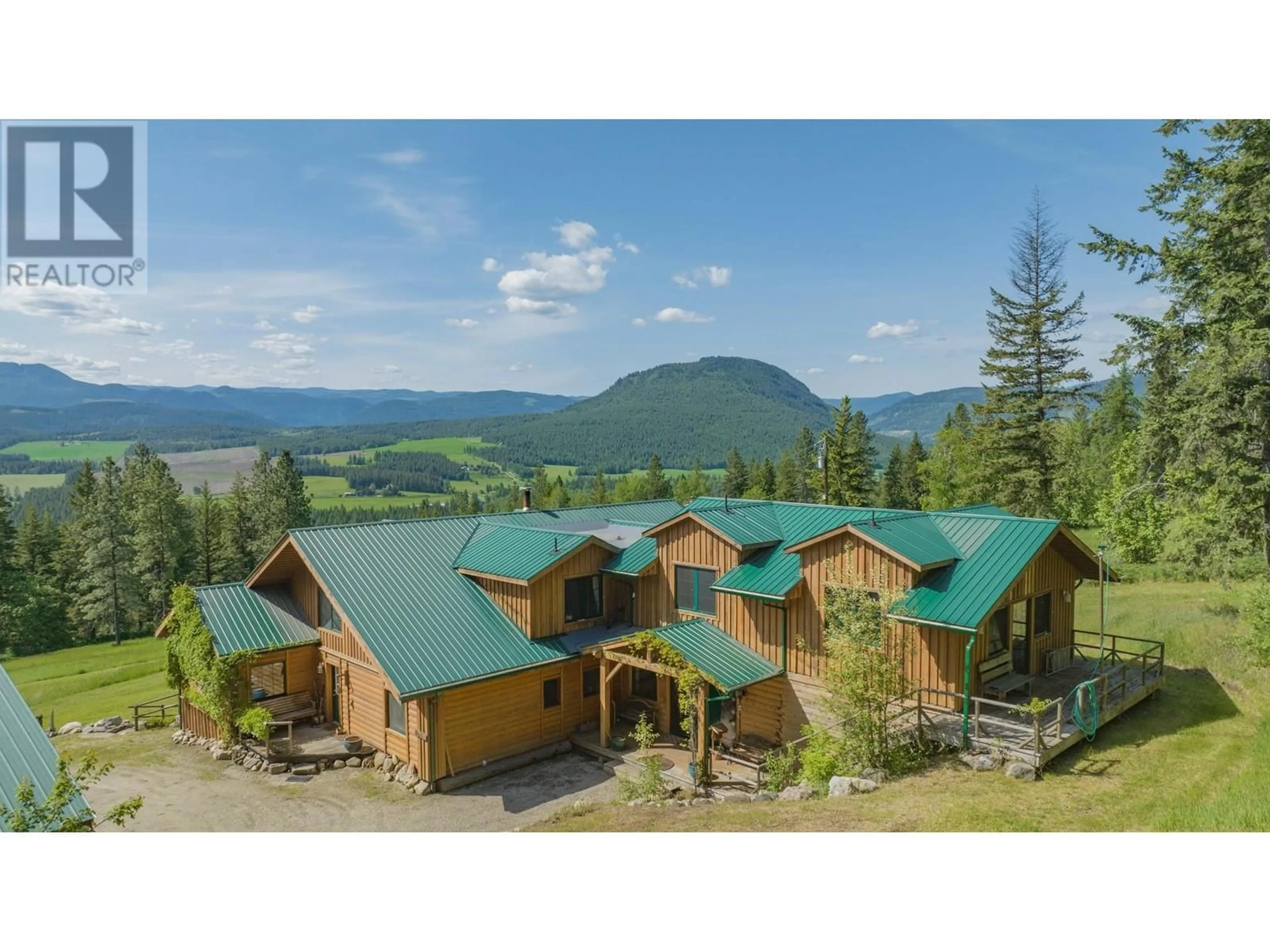 A pic from outside/outdoor area/front of a property/back of a property/a pic from drone, mountain view for 233 ALBERS ROAD, Lumby British Columbia V0E2G5