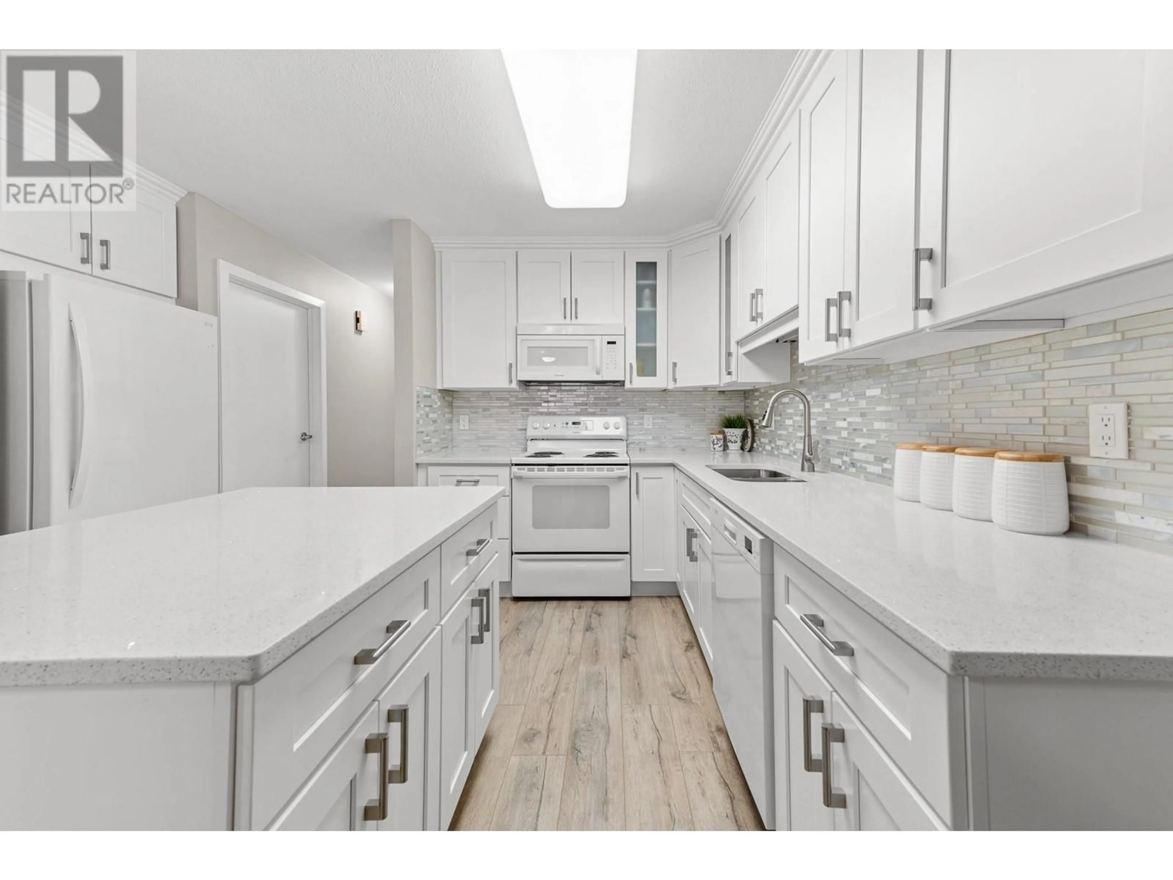 Open concept kitchen, ceramic/tile floor for 2235 BASKIN Street Unit# 115, Penticton British Columbia V2A8A8