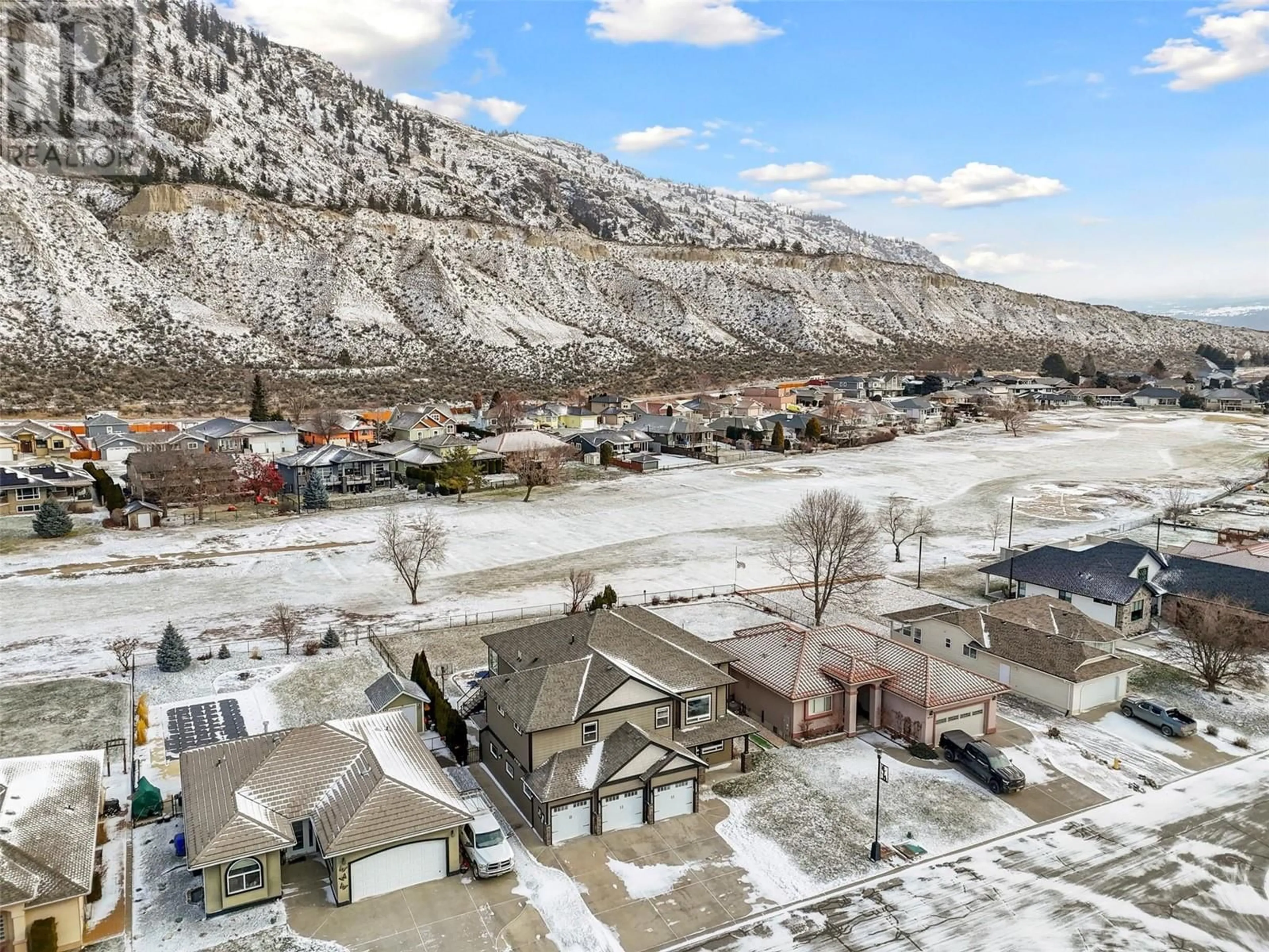 A pic from outside/outdoor area/front of a property/back of a property/a pic from drone, mountain view for 3732 Navatanee Drive, Kamloops British Columbia V2H1S1