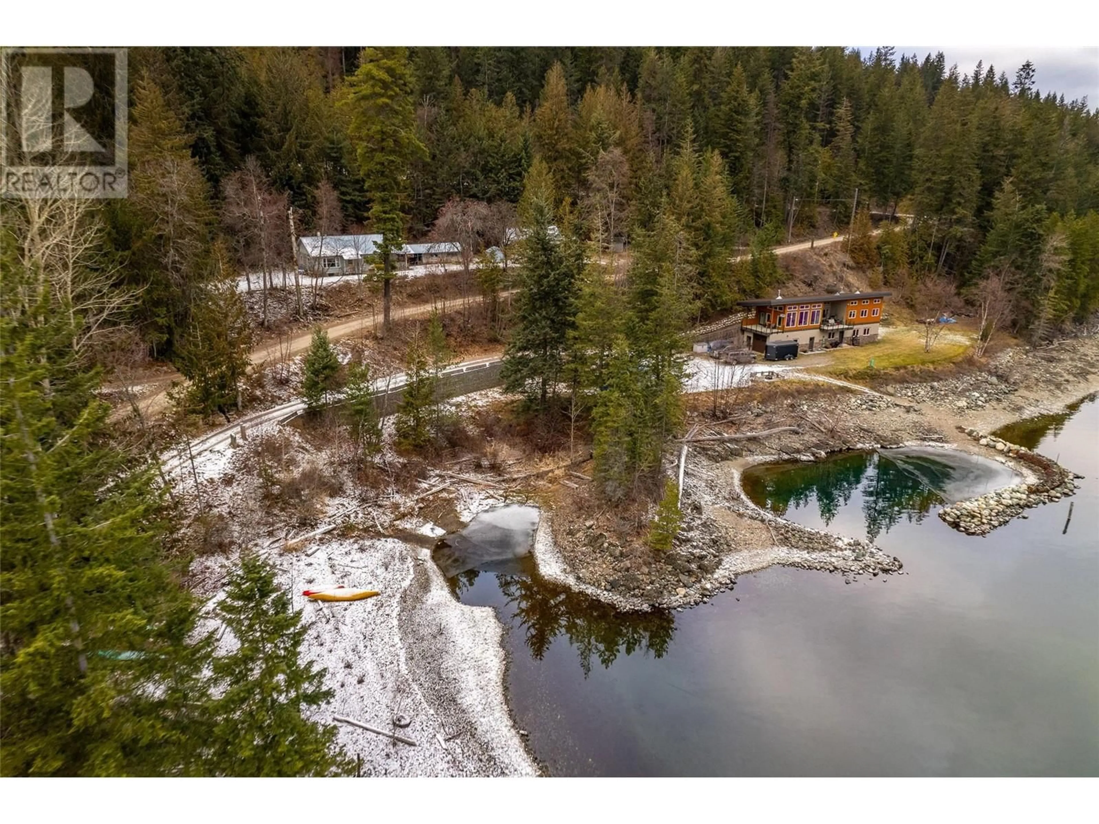 A pic from outside/outdoor area/front of a property/back of a property/a pic from drone, water/lake/river/ocean view for 8927 Koehle Road, Kaslo British Columbia V0G1M0