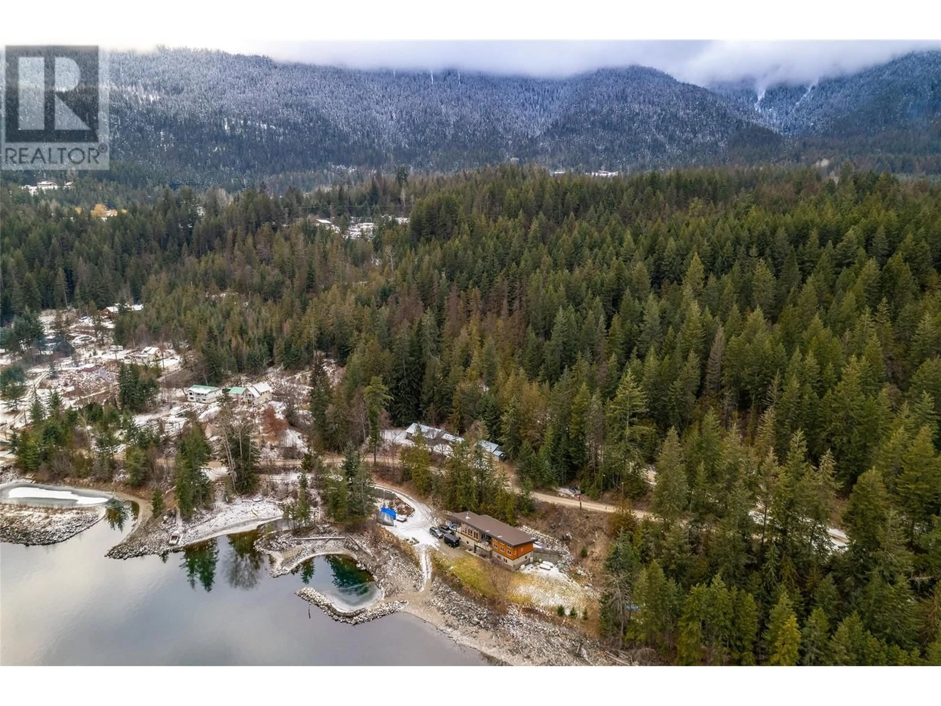 A pic from outside/outdoor area/front of a property/back of a property/a pic from drone, water/lake/river/ocean view for 8927 Koehle Road, Kaslo British Columbia V0G1M0