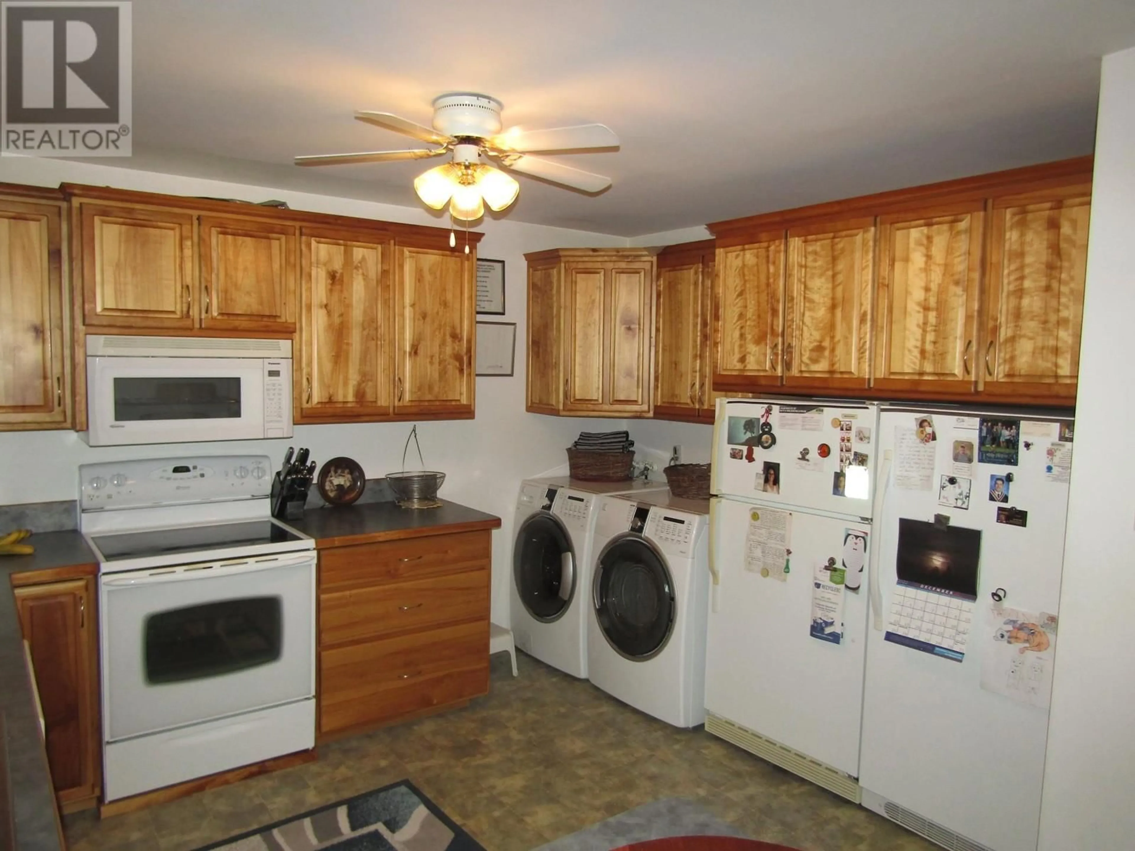 Standard kitchen, wood/laminate floor for #1 6780 21 Street, Grand Forks British Columbia V0H1H0