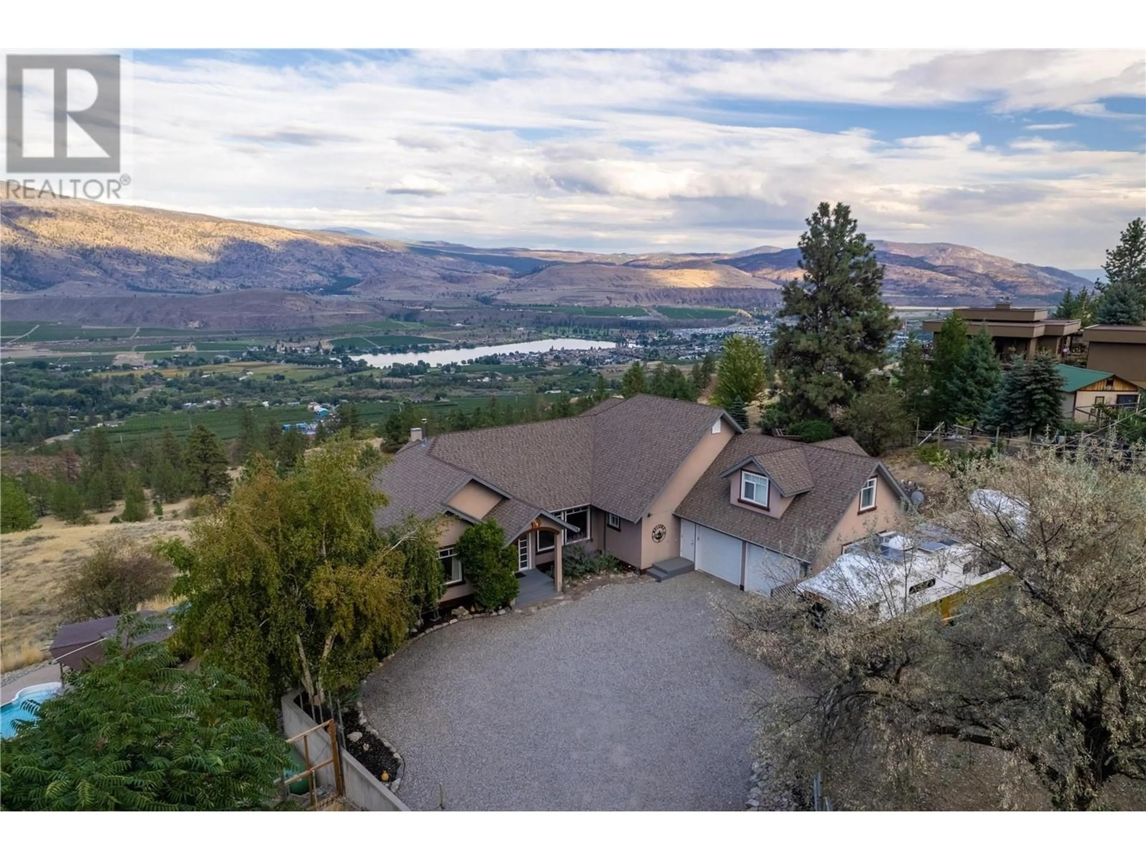 A pic from outside/outdoor area/front of a property/back of a property/a pic from drone, mountain view for 614 Wilson Mountain Road, Oliver British Columbia V0H1T5