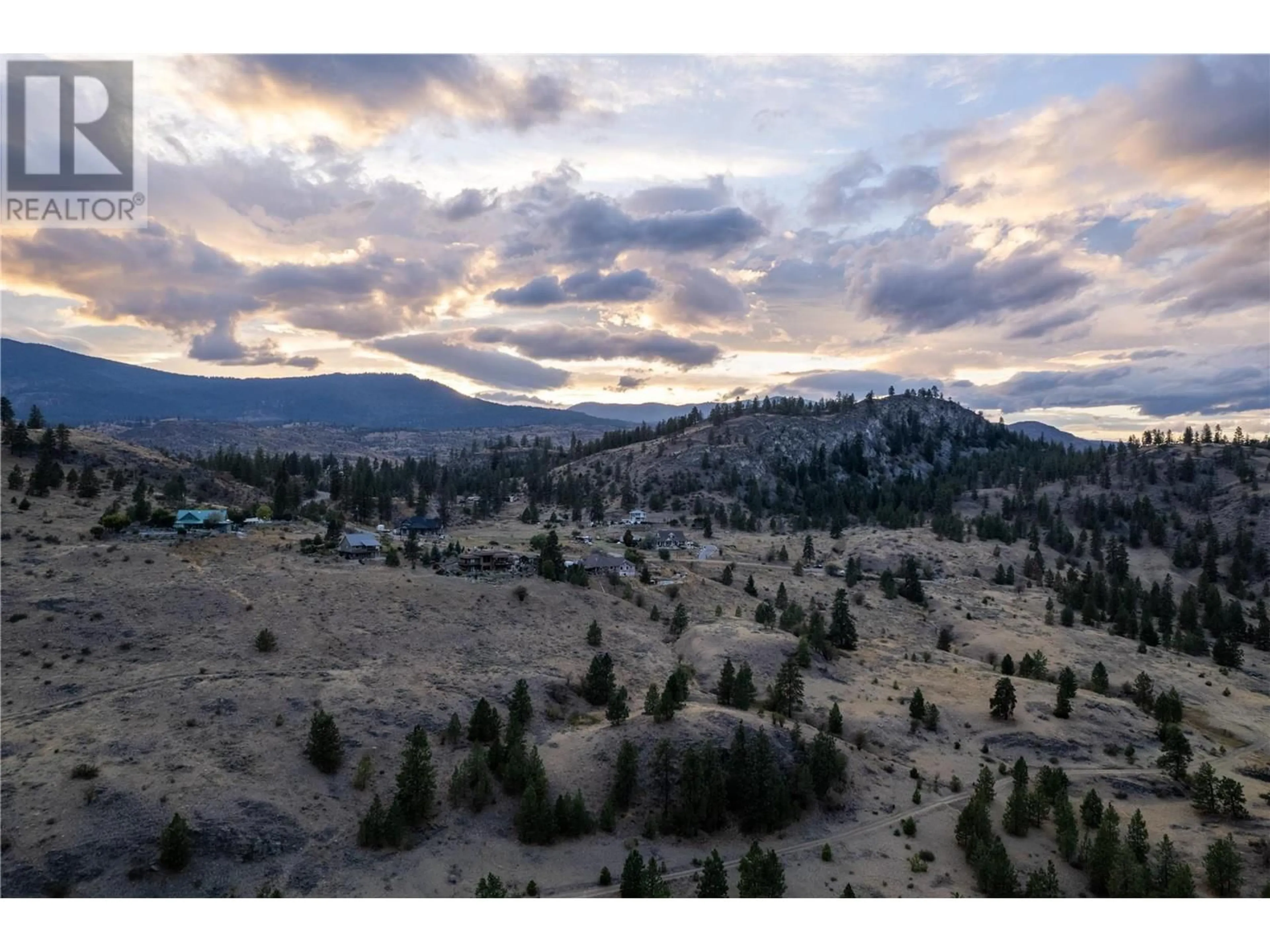 A pic from outside/outdoor area/front of a property/back of a property/a pic from drone, mountain view for 614 Wilson Mountain Road, Oliver British Columbia V0H1T5