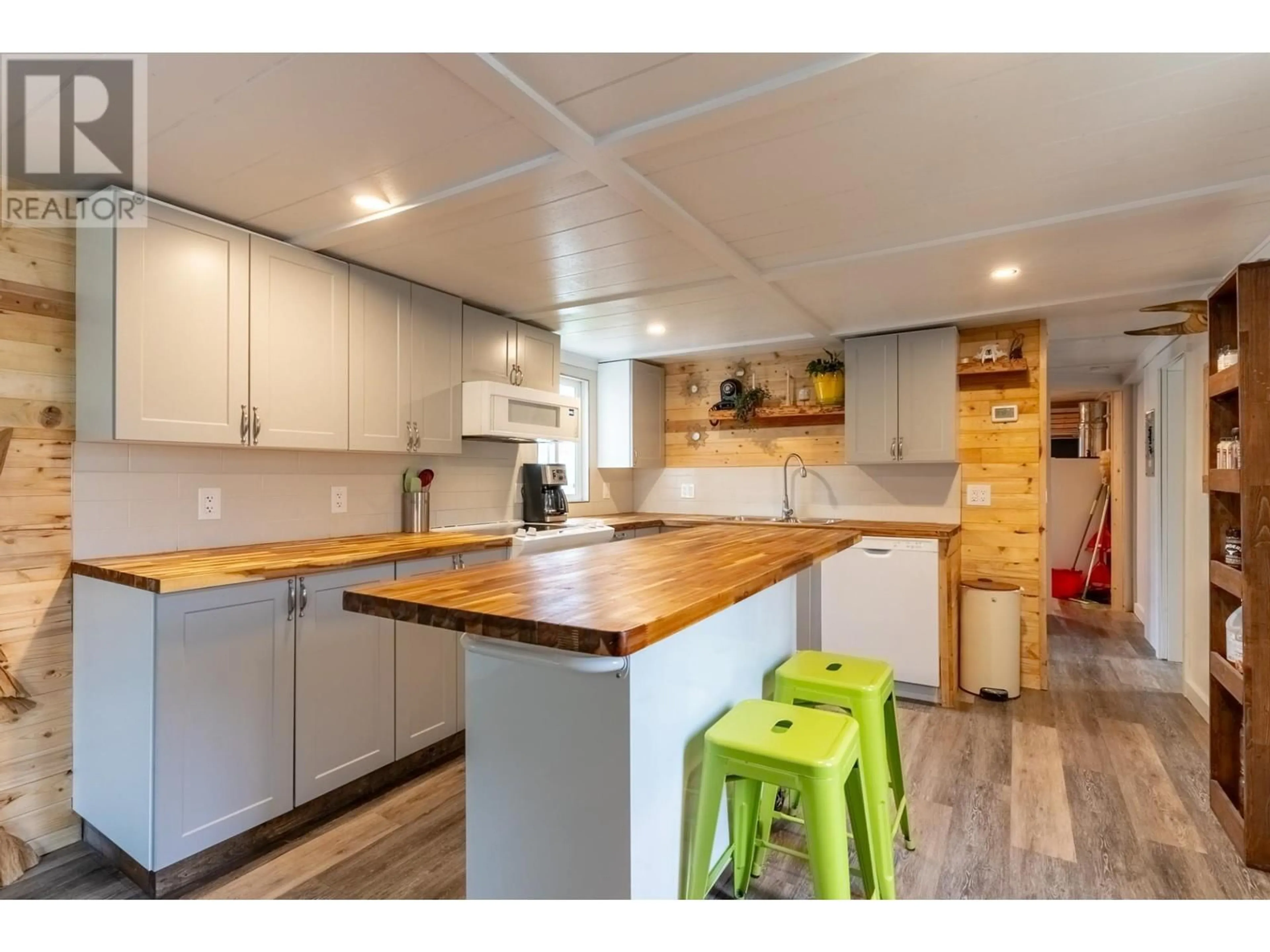 Open concept kitchen, wood/laminate floor for 1375 Ord Road Unit# 1, Kamloops British Columbia V2B7V3