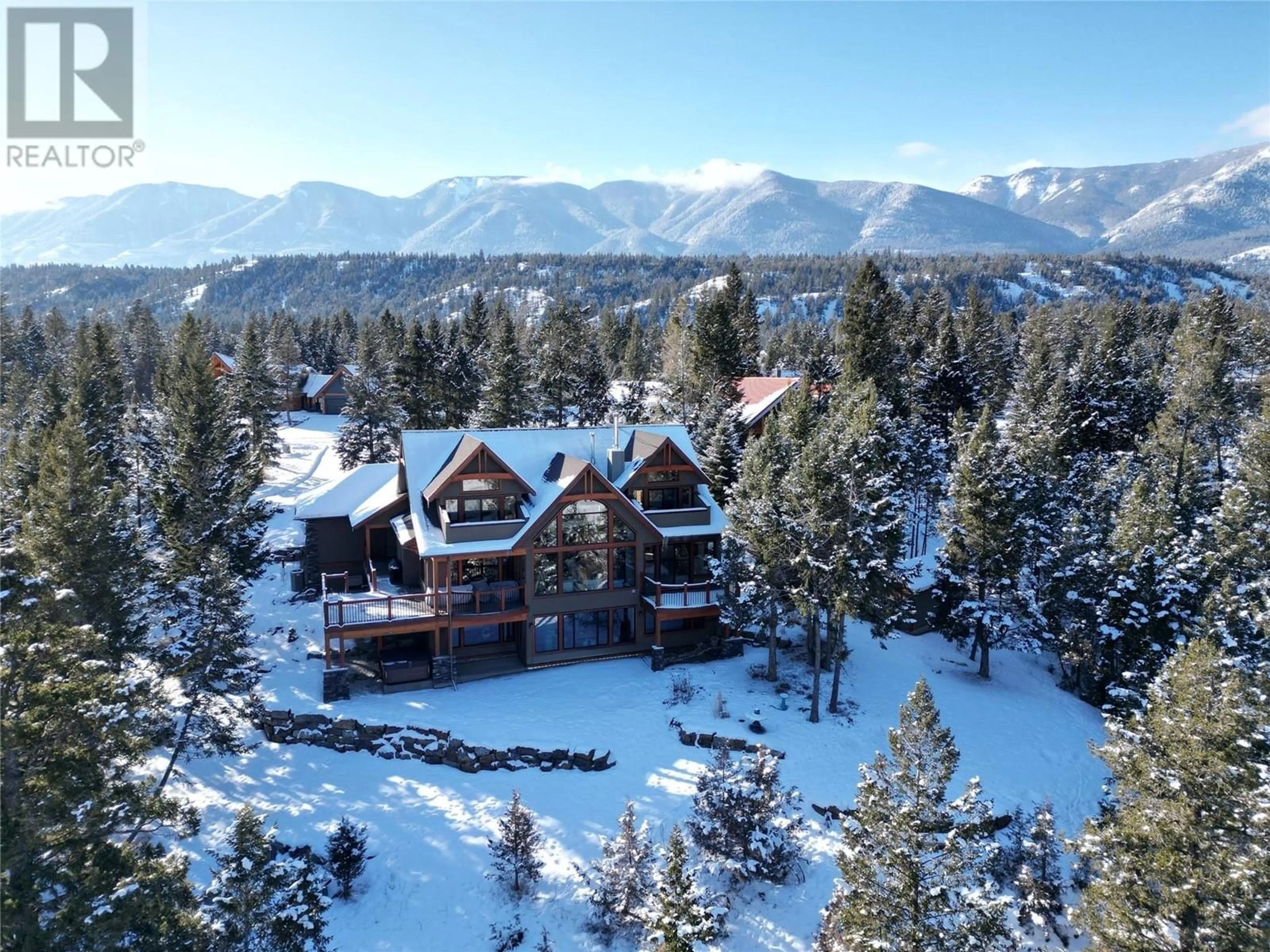 A pic from outside/outdoor area/front of a property/back of a property/a pic from drone, mountain view for 4487 FIR Bay, Fairmont Hot Springs British Columbia V0B1L2