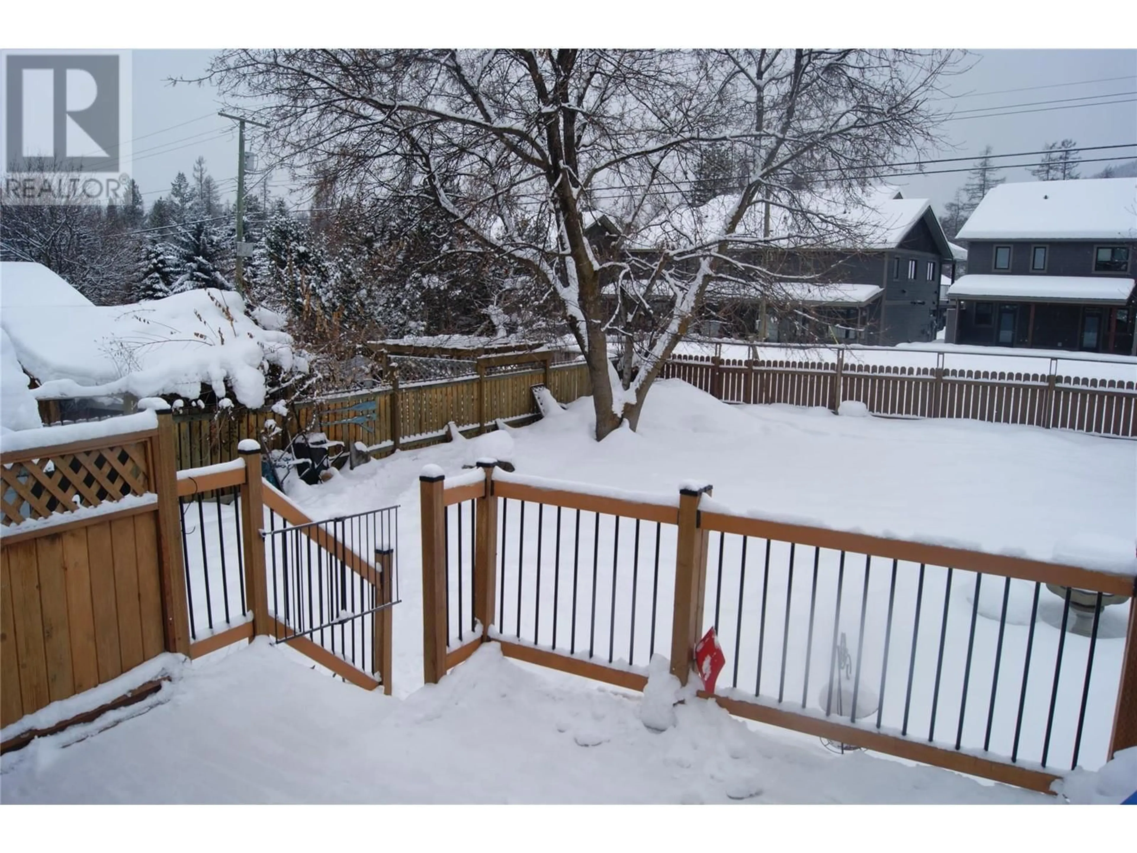 A pic from outside/outdoor area/front of a property/back of a property/a pic from drone, street for 62 100TH Avenue, Kimberley British Columbia V1A3A3