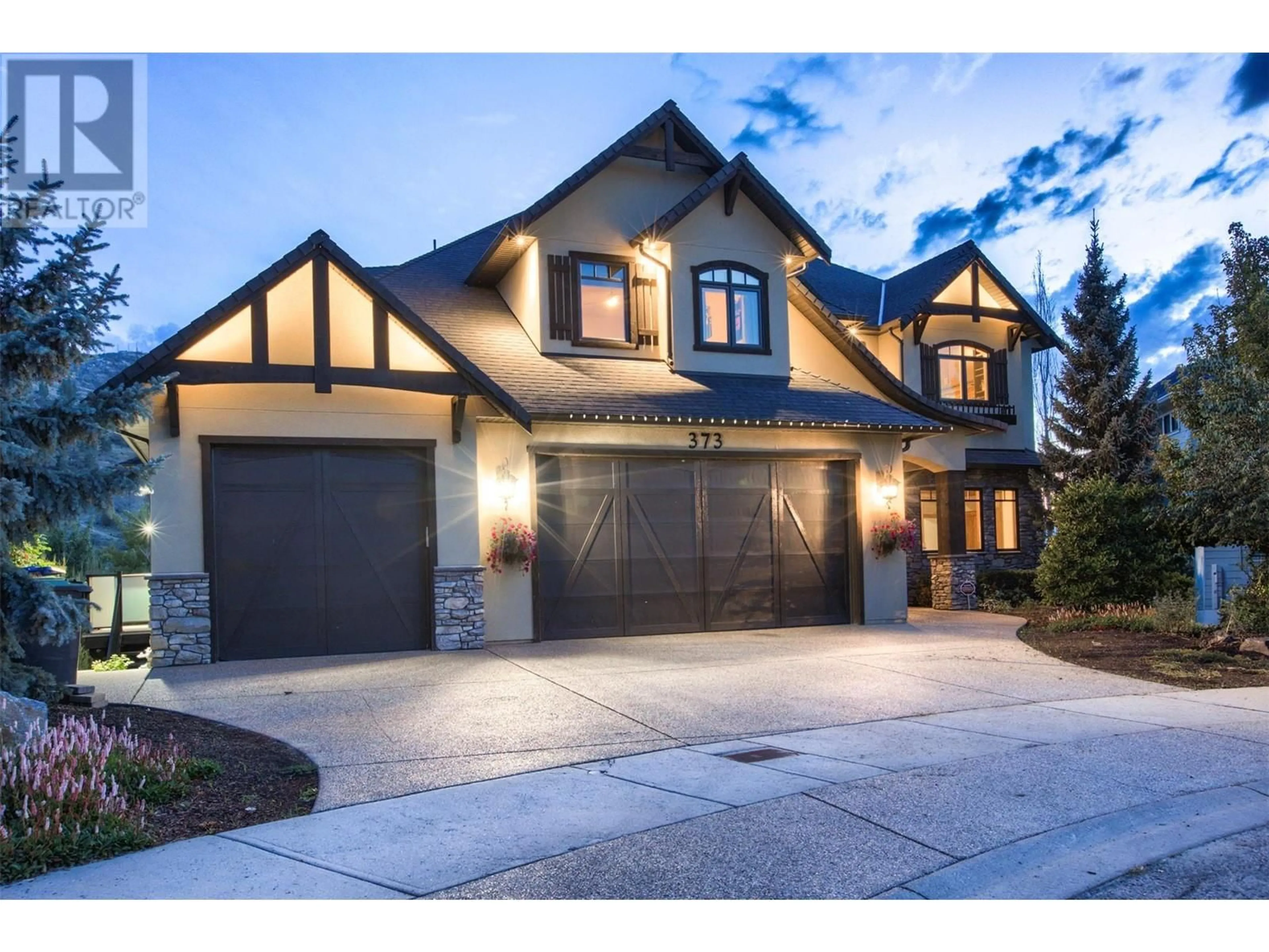 Home with brick exterior material, street for 373 Farron Court, Kelowna British Columbia V1W5H2