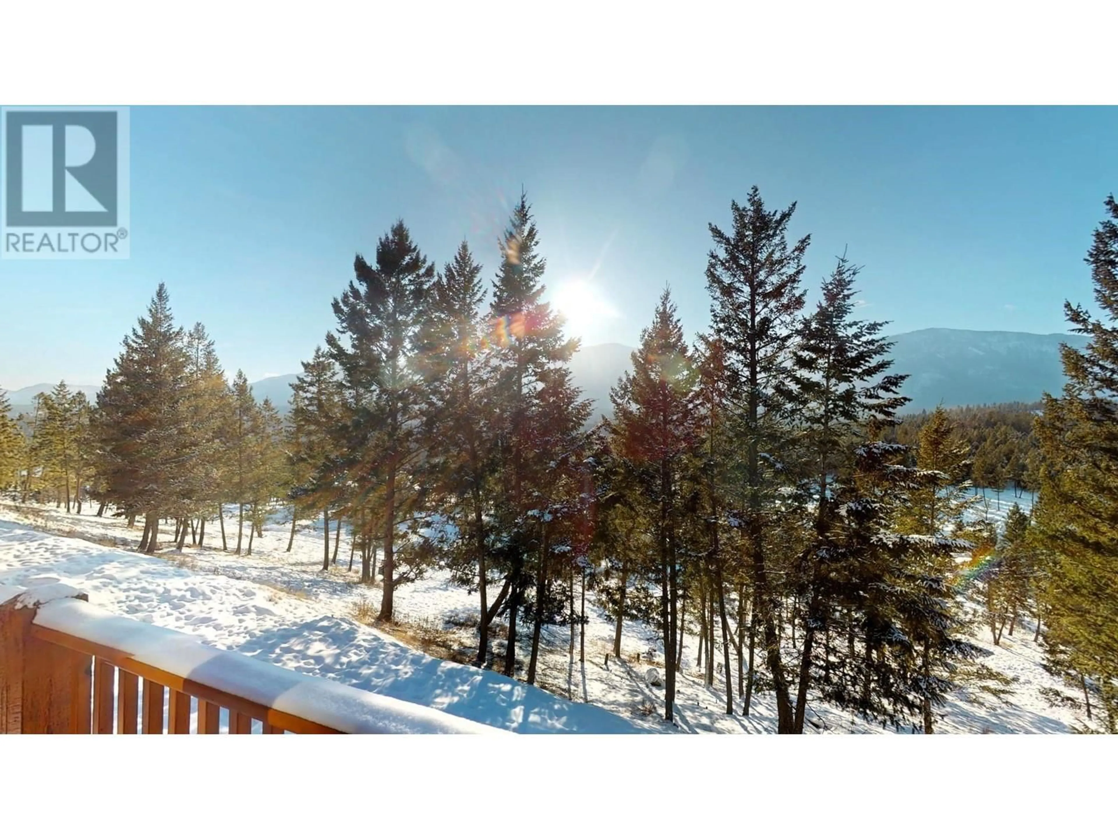 A pic from outside/outdoor area/front of a property/back of a property/a pic from drone, forest/trees view for 2598 MOUNTAINVIEW Crescent Unit# 4, Invermere British Columbia V0A1K6