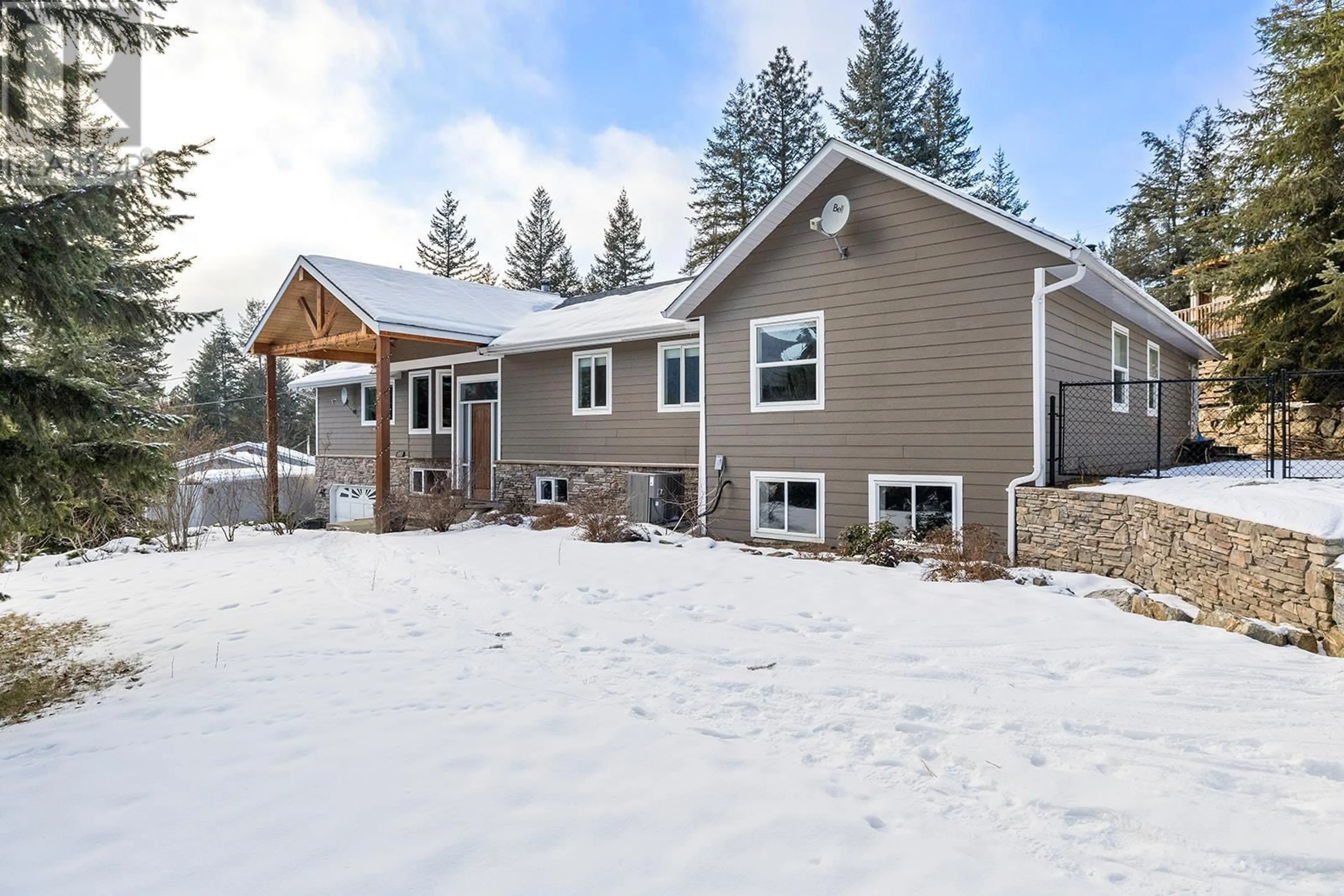 Home with vinyl exterior material, mountain view for 7992 FALCON RIDGE CRESCENT, Kelowna British Columbia V1P1J2