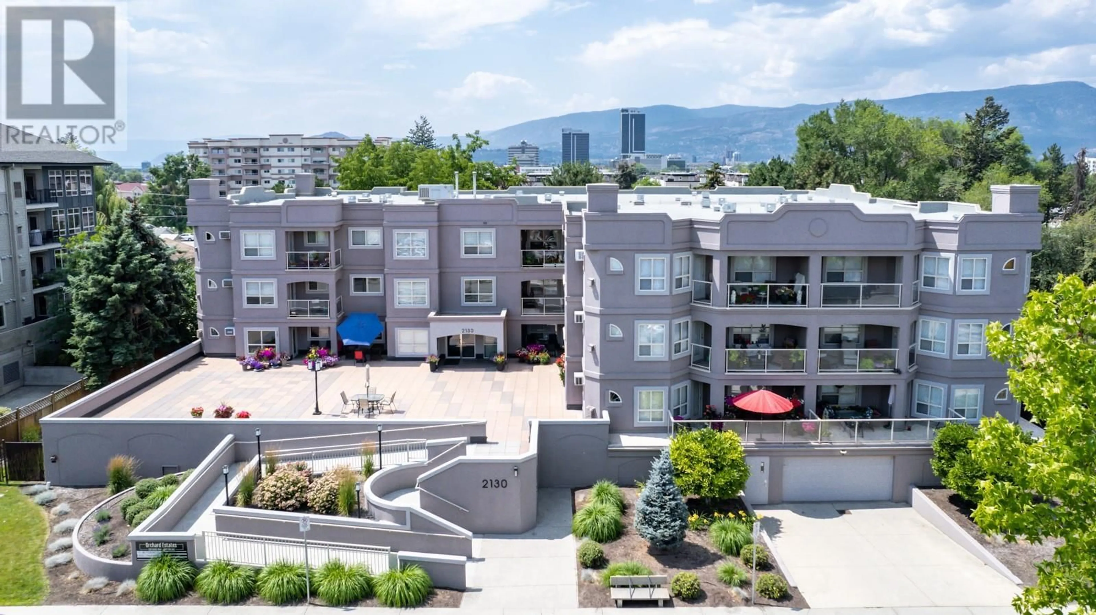 A pic from outside/outdoor area/front of a property/back of a property/a pic from drone, mountain view for 2130 Vasile Road Unit# 108, Kelowna British Columbia V1Y6H5