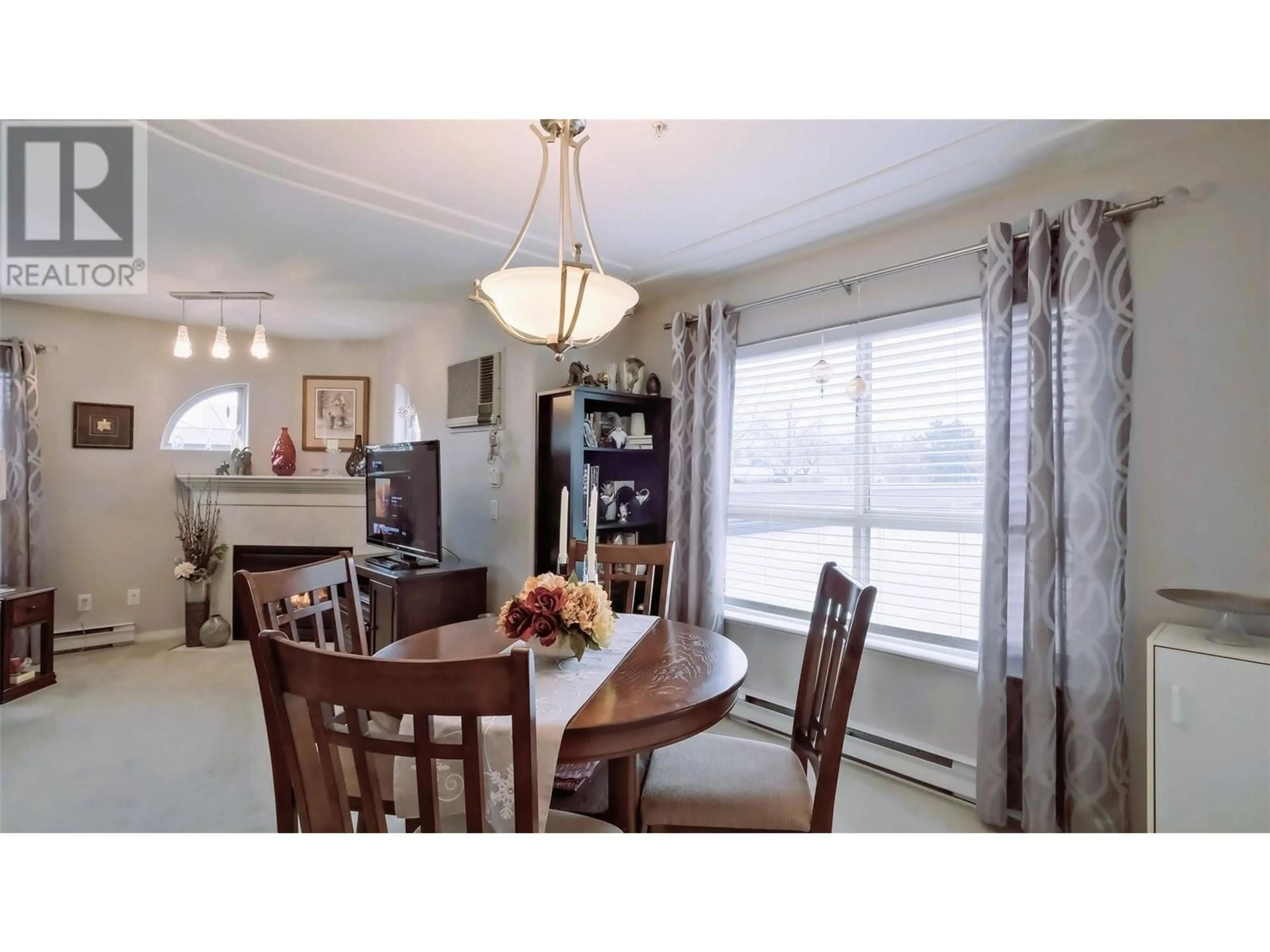 Dining room, wood/laminate floor for 2130 Vasile Road Unit# 108, Kelowna British Columbia V1Y6H5