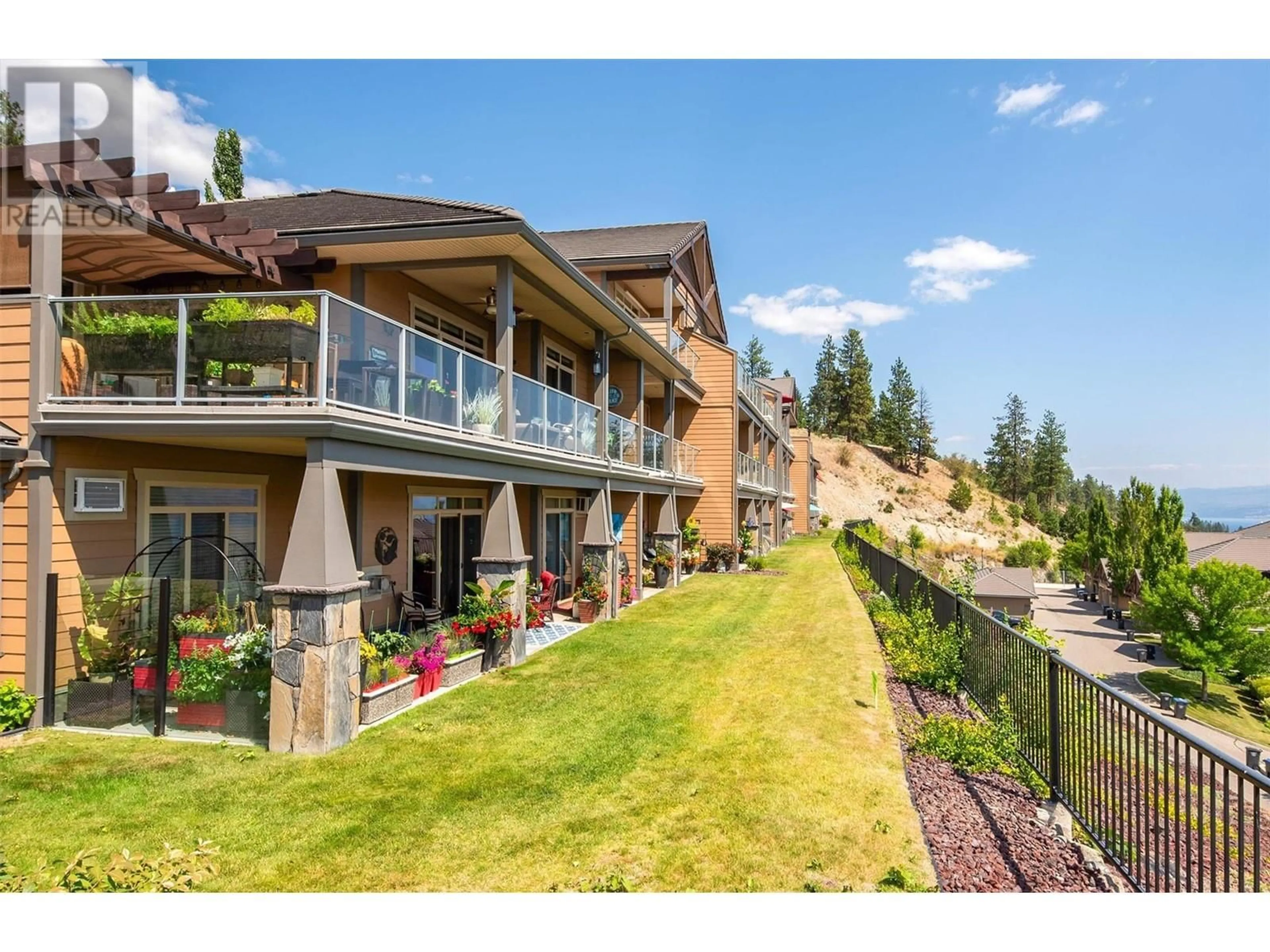 A pic from outside/outdoor area/front of a property/back of a property/a pic from drone, mountain view for 4350 Ponderosa Drive Unit# 236 Lot# 86, Peachland British Columbia V0H1X5