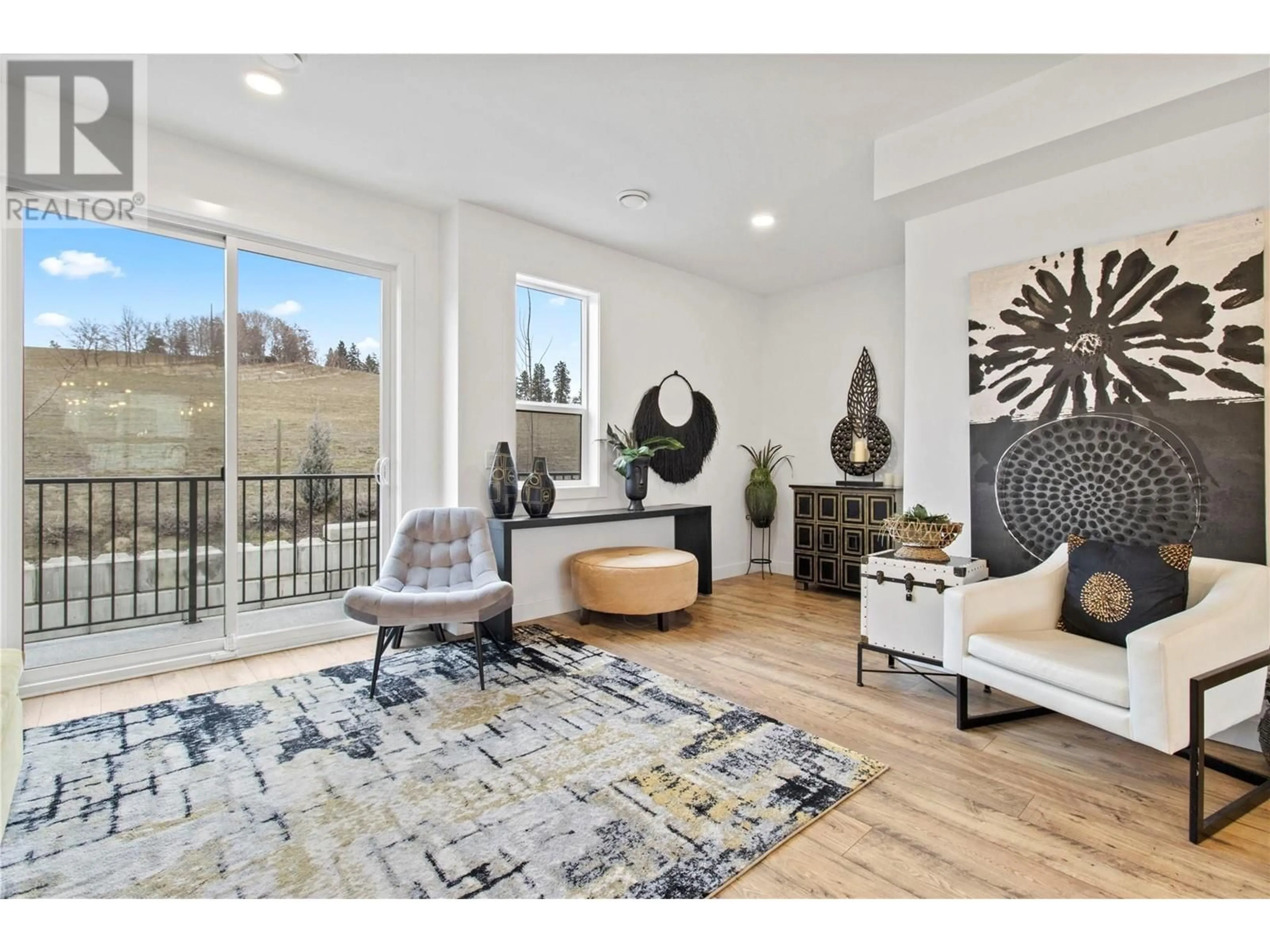 Living room with furniture, unknown for 12075 OCEOLA Road Unit# 3, Lake Country British Columbia V4V0A7