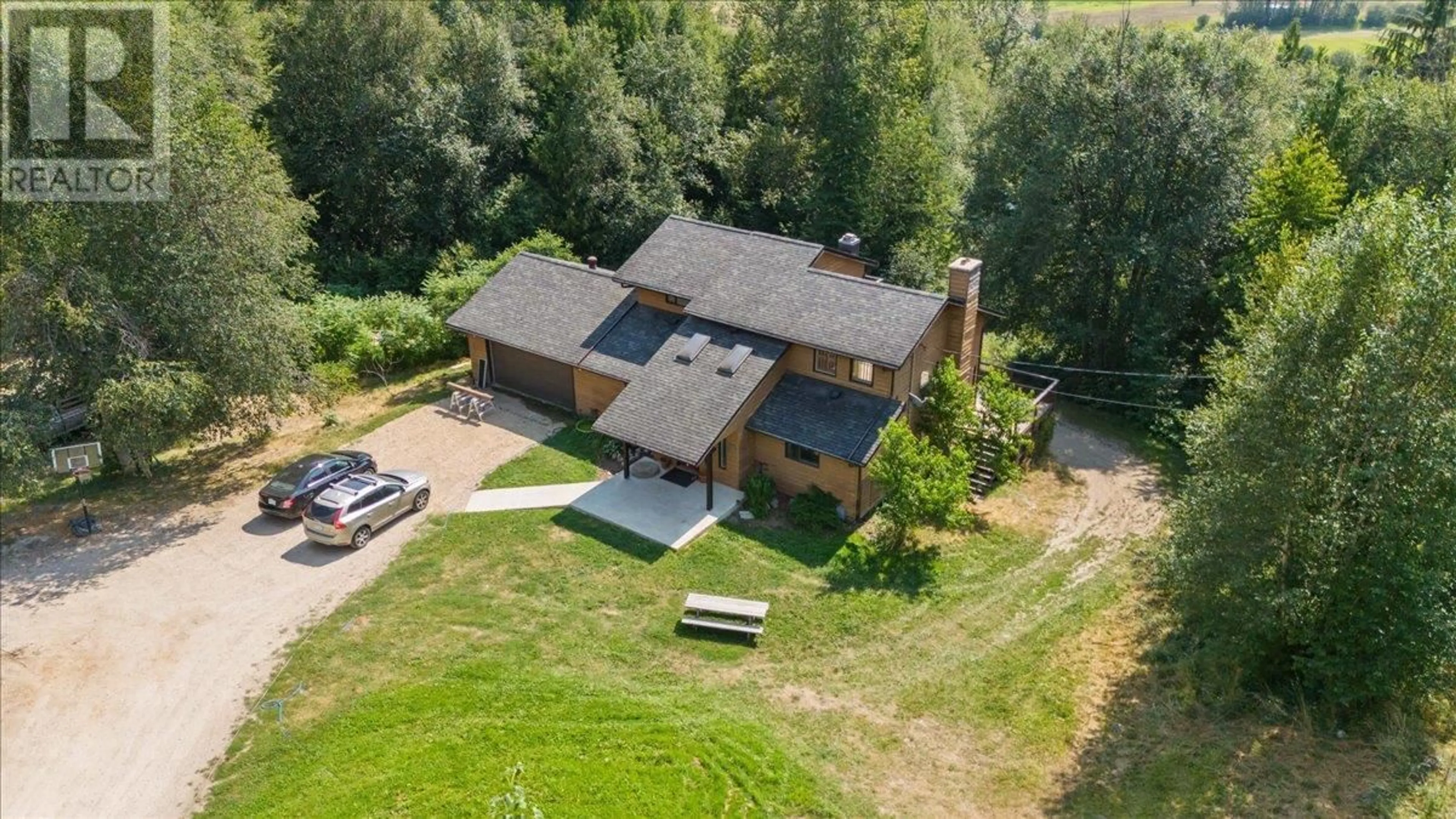 A pic from outside/outdoor area/front of a property/back of a property/a pic from drone, unknown for 6172 SLOCAN RIVER Road, Winlaw British Columbia V0G2J0