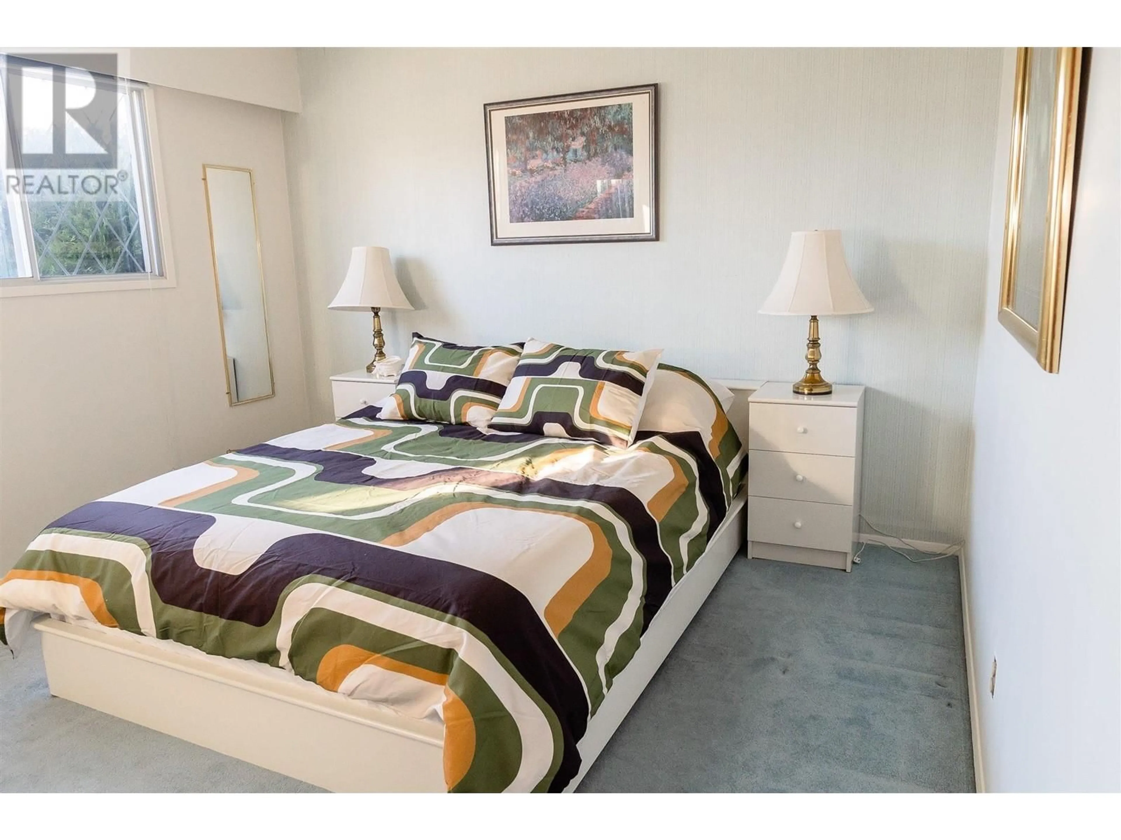 Bedroom with bed, carpet floor for 1738 SMITHSON DRIVE, Kelowna British Columbia V1Y4E3