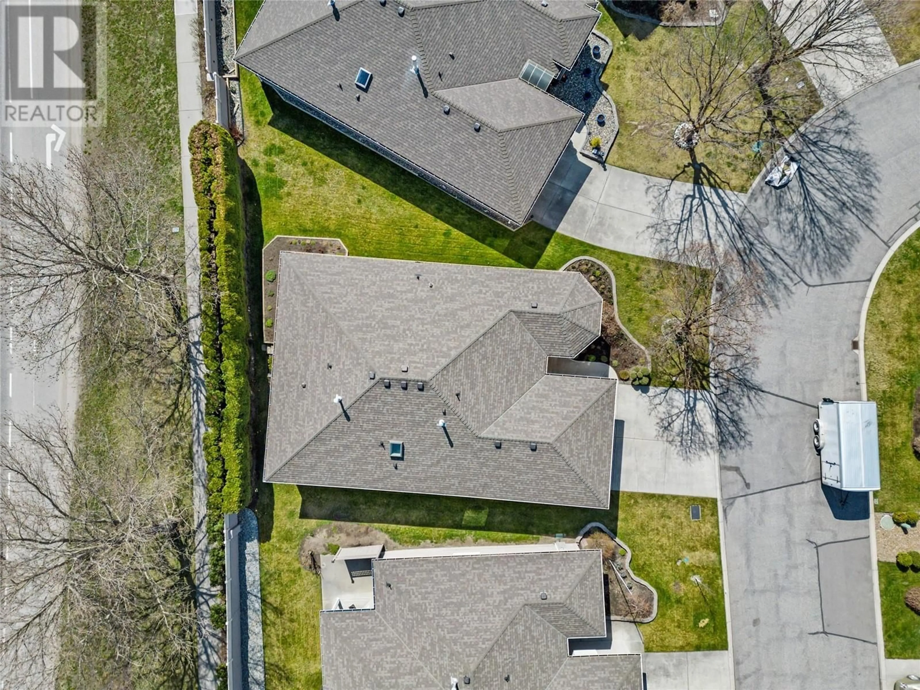 A pic from outside/outdoor area/front of a property/back of a property/a pic from drone, street for 75 - 615 GLENMEADOWS ROAD, Kelowna British Columbia V1V1N9