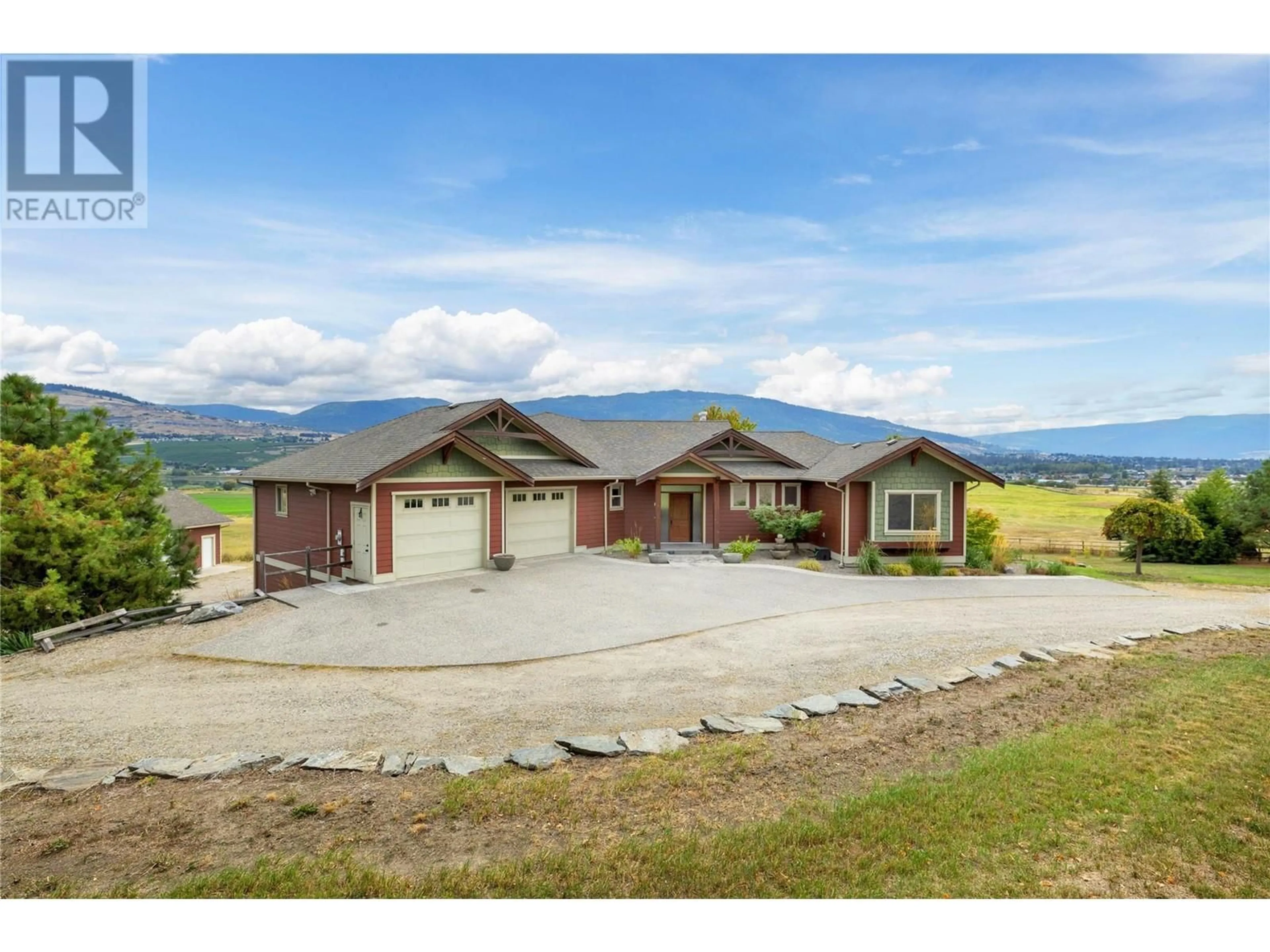 A pic from outside/outdoor area/front of a property/back of a property/a pic from drone, mountain view for 6325 Old Kamloops Road, Vernon British Columbia V1H1P8