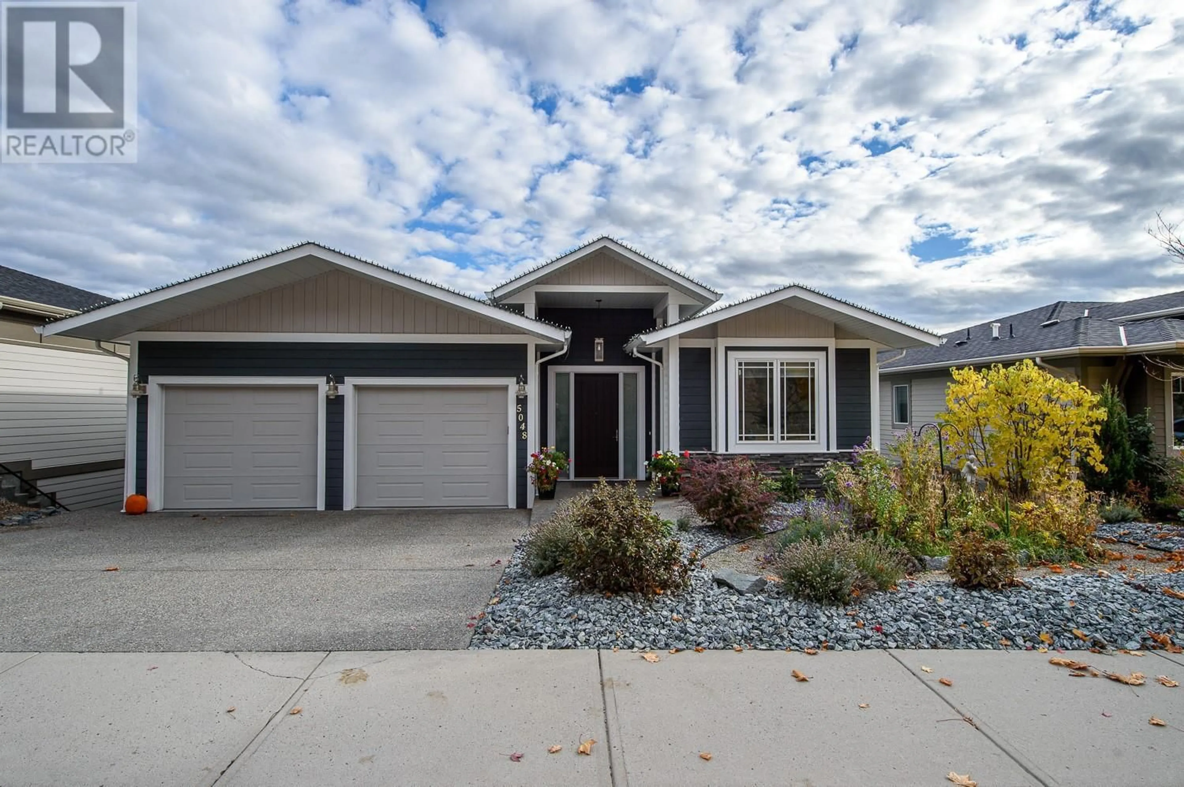 Home with vinyl exterior material, street for 5048 Turtle Pond Place, Vernon British Columbia V1T9Y5