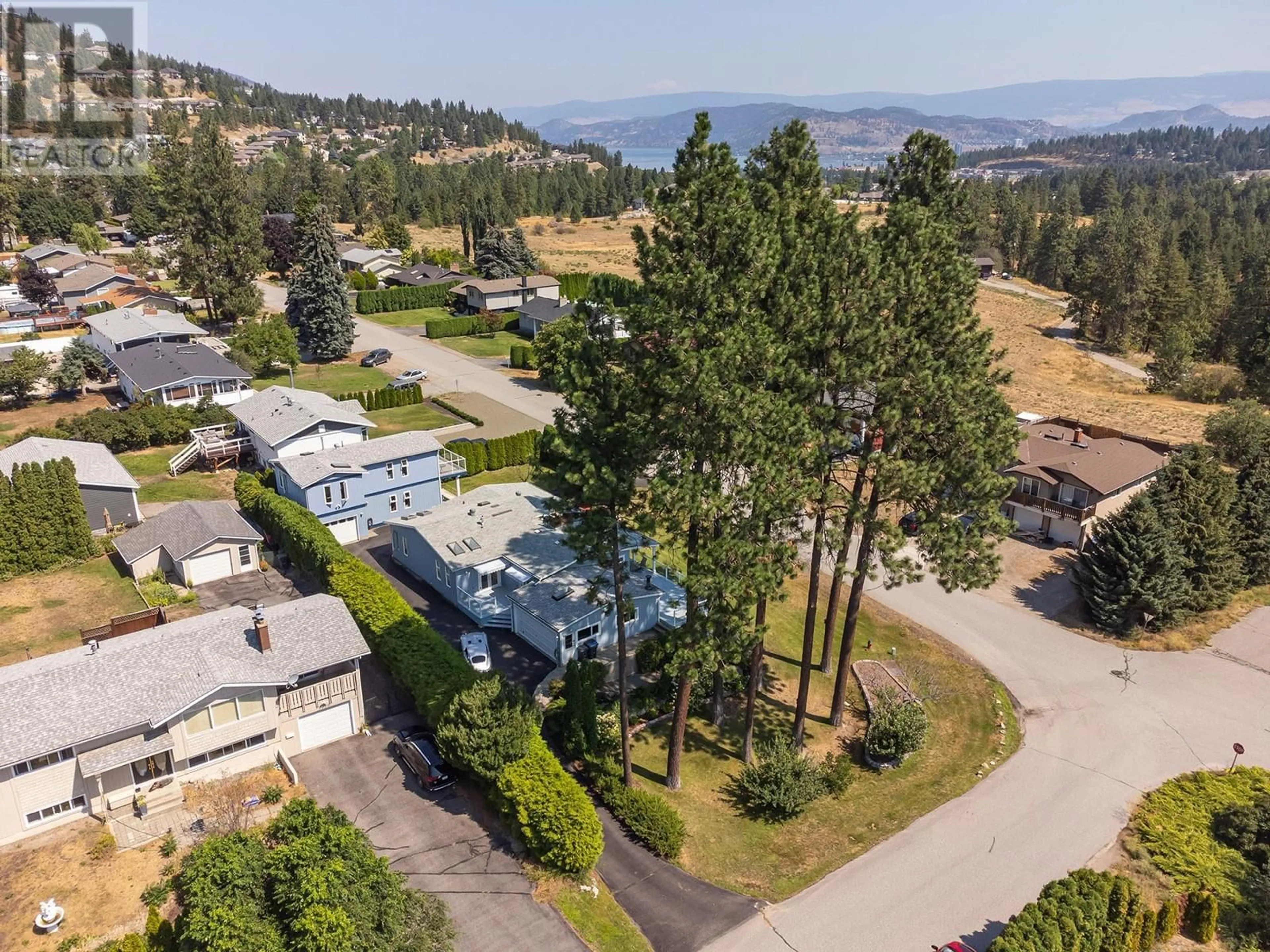 A pic from outside/outdoor area/front of a property/back of a property/a pic from drone, mountain view for 2280 Somerset Road, West Kelowna British Columbia V1z2K8