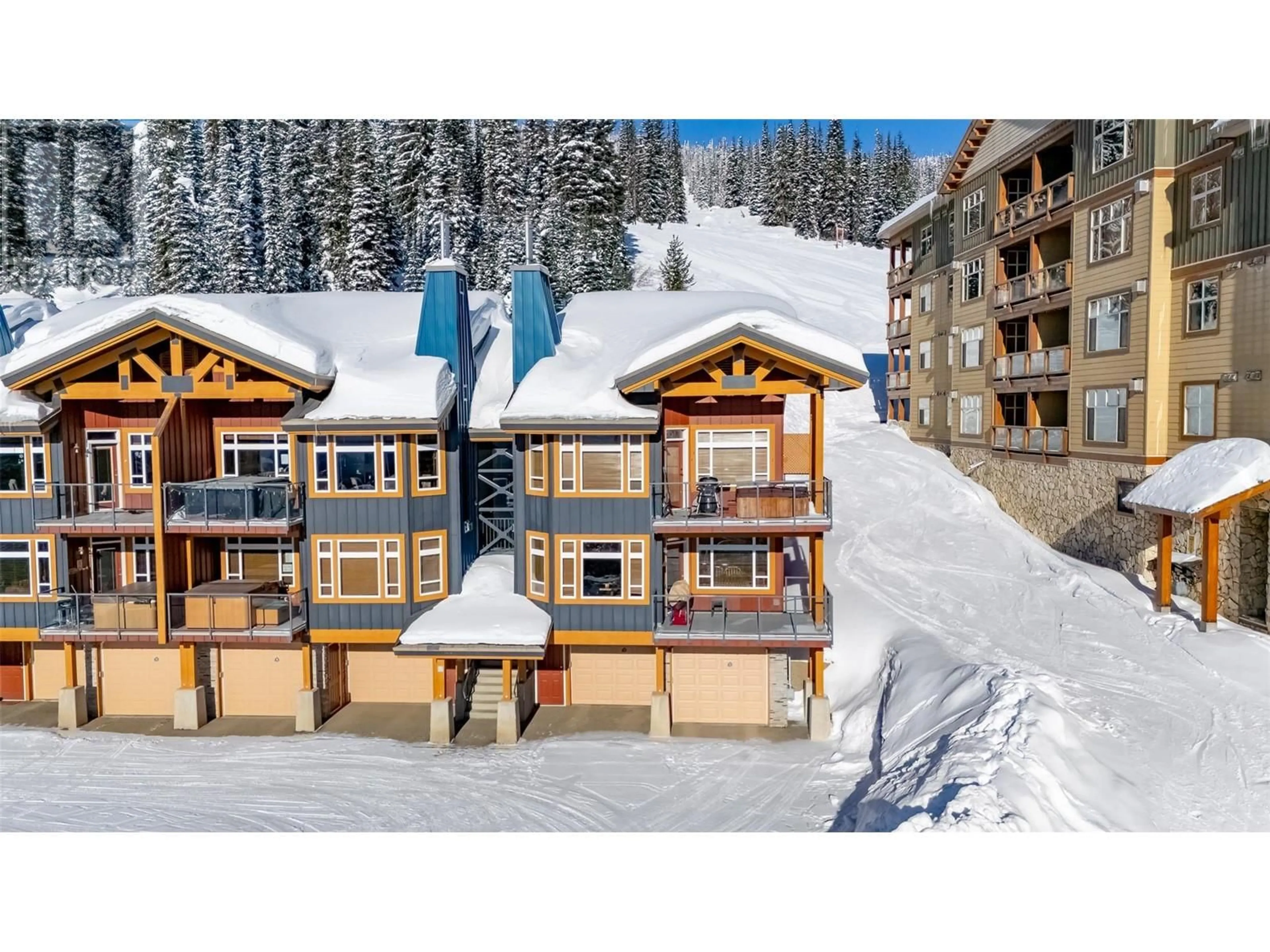 A pic from outside/outdoor area/front of a property/back of a property/a pic from drone, unknown for 7650 Porcupine Road Unit# 2, Big White British Columbia V1P1P3