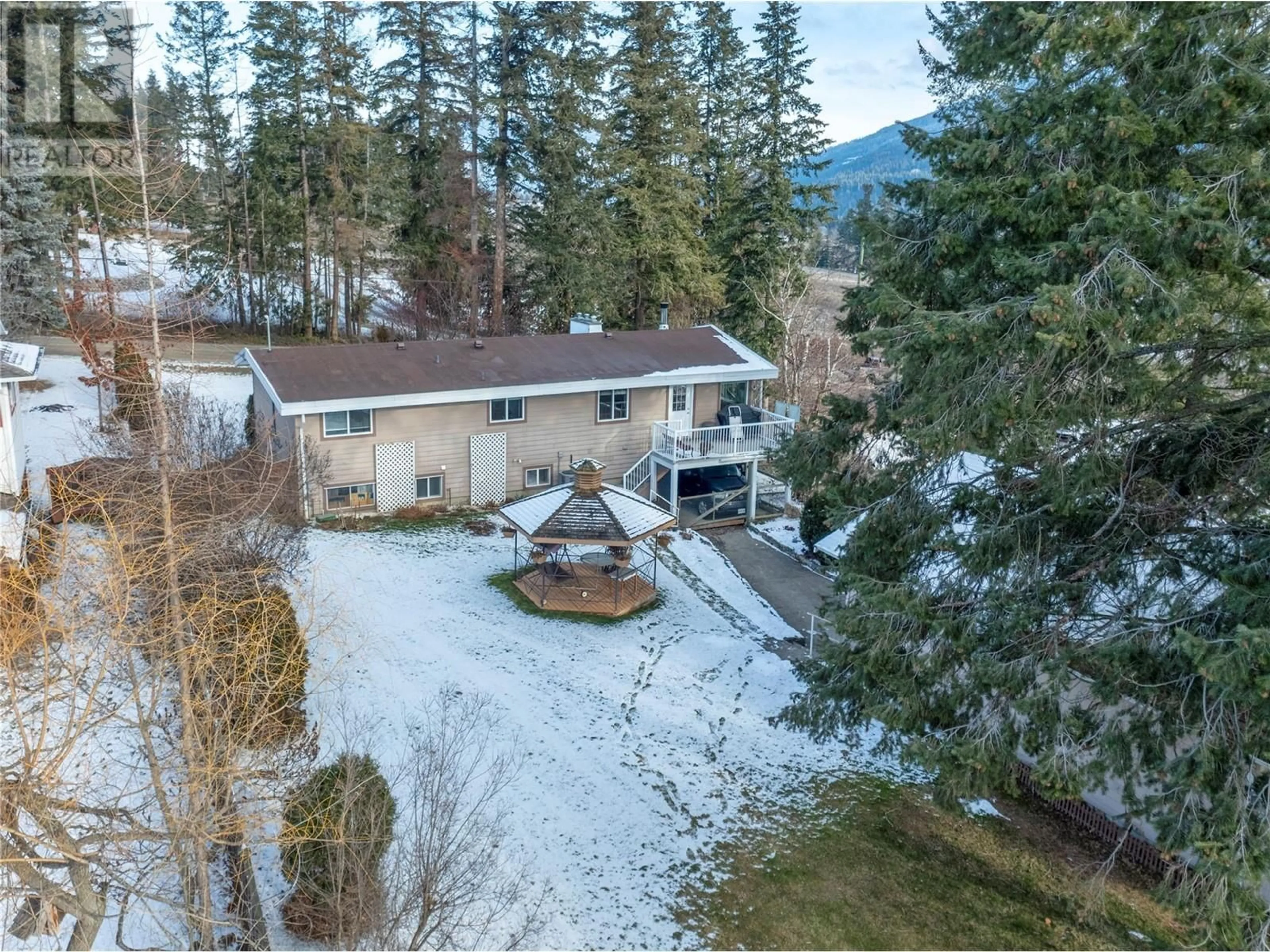 A pic from outside/outdoor area/front of a property/back of a property/a pic from drone, mountain view for 3740 20 Avenue NE, Salmon Arm British Columbia V1E1Z3