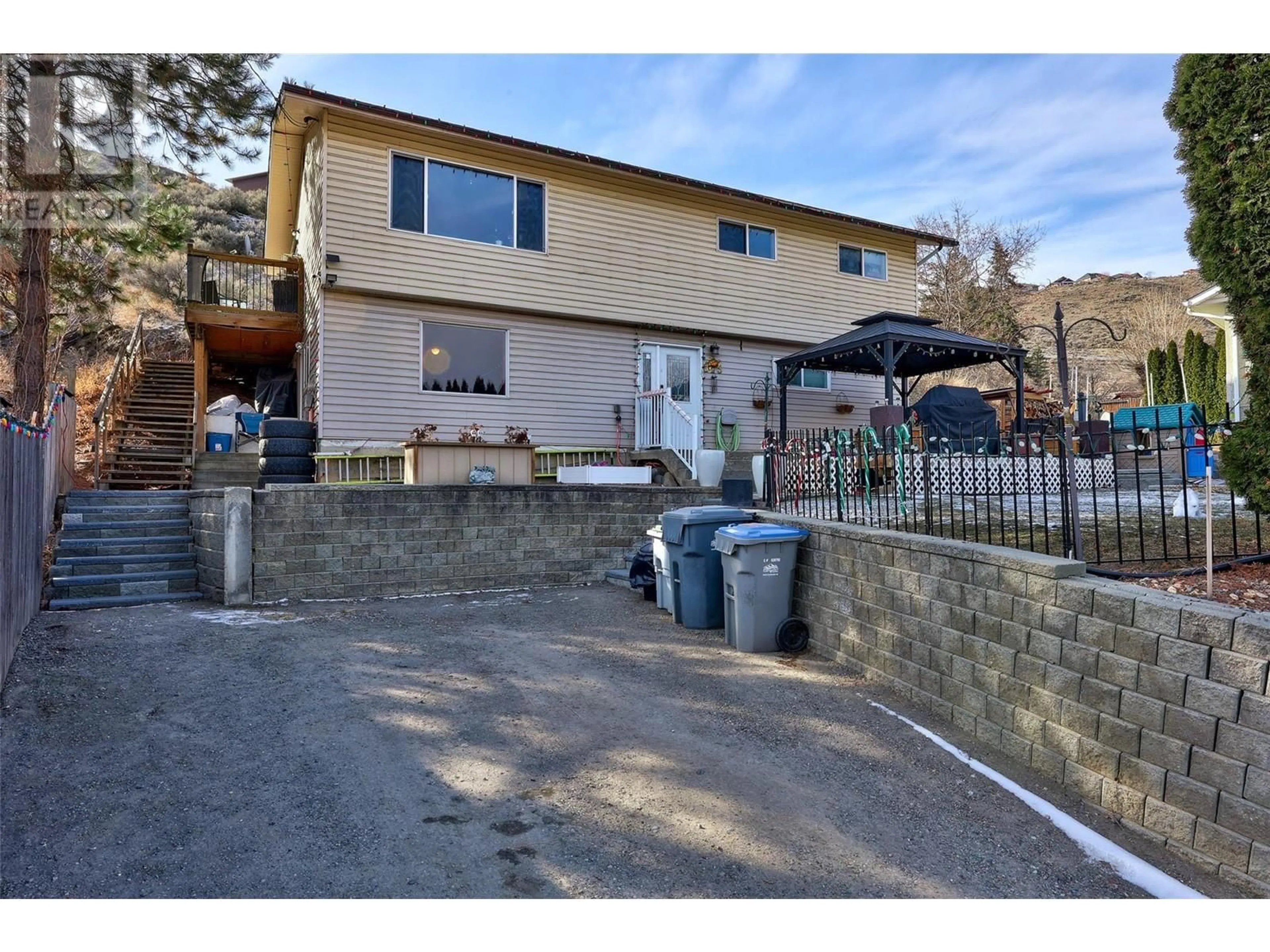 A pic from outside/outdoor area/front of a property/back of a property/a pic from drone, street for 813 MCQUEEN Drive, Kamloops British Columbia V2B7X8