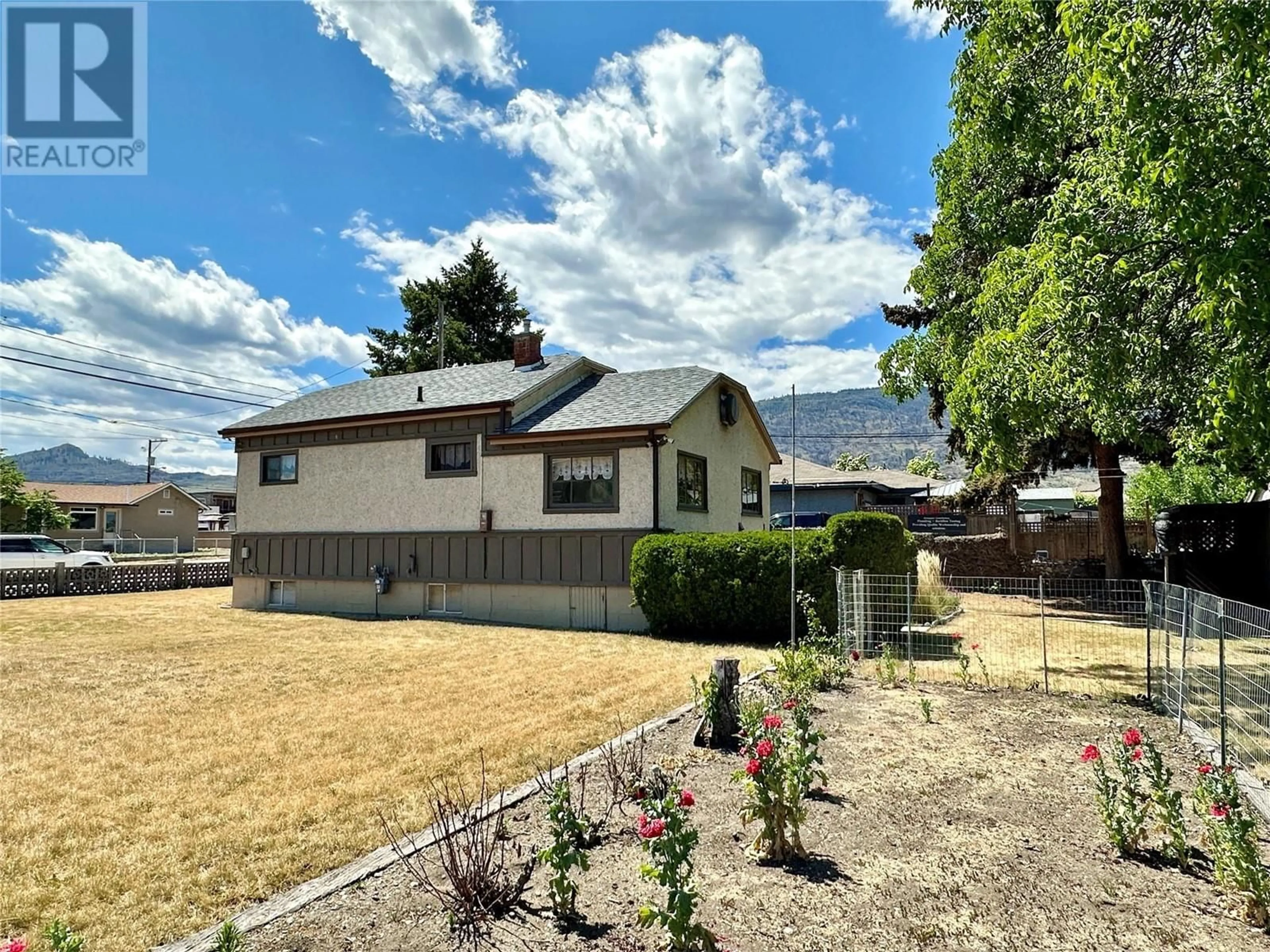 A pic from outside/outdoor area/front of a property/back of a property/a pic from drone, street for 8502 78TH Avenue, Osoyoos British Columbia V0H1V0