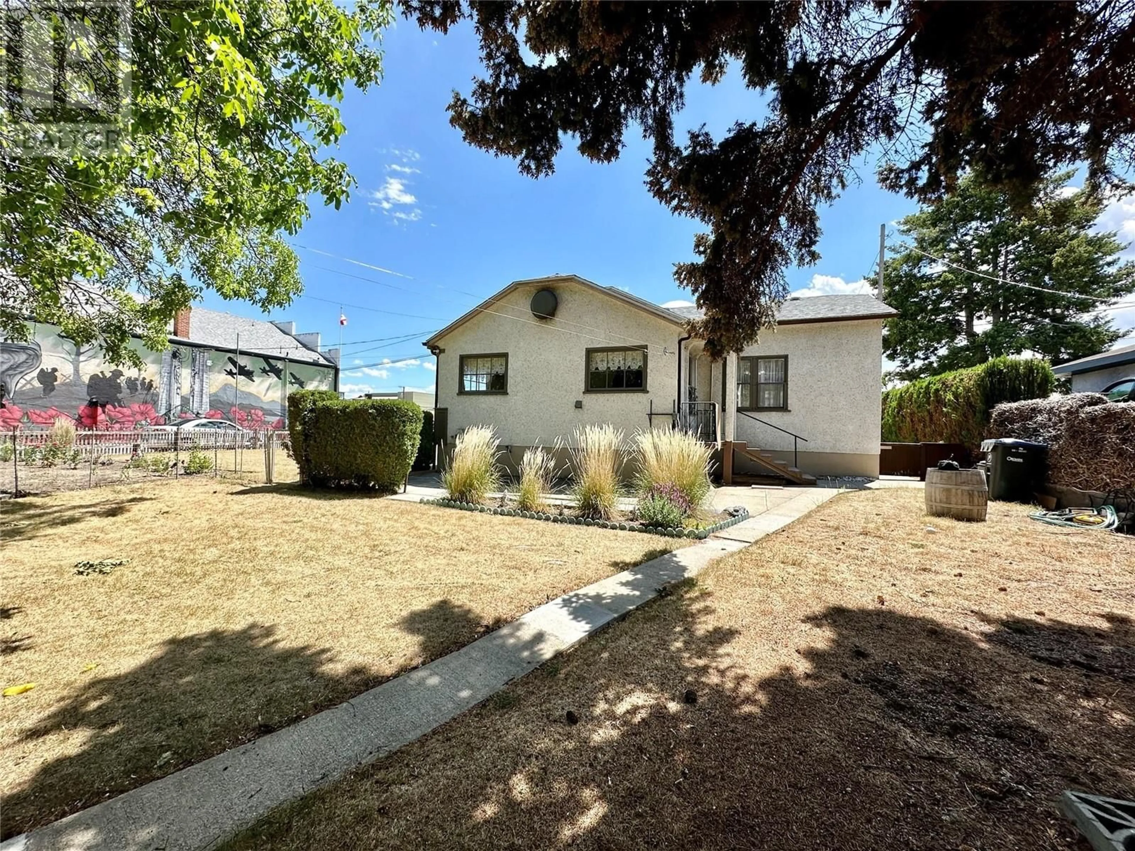 A pic from outside/outdoor area/front of a property/back of a property/a pic from drone, street for 8502 78TH Avenue, Osoyoos British Columbia V0H1V0