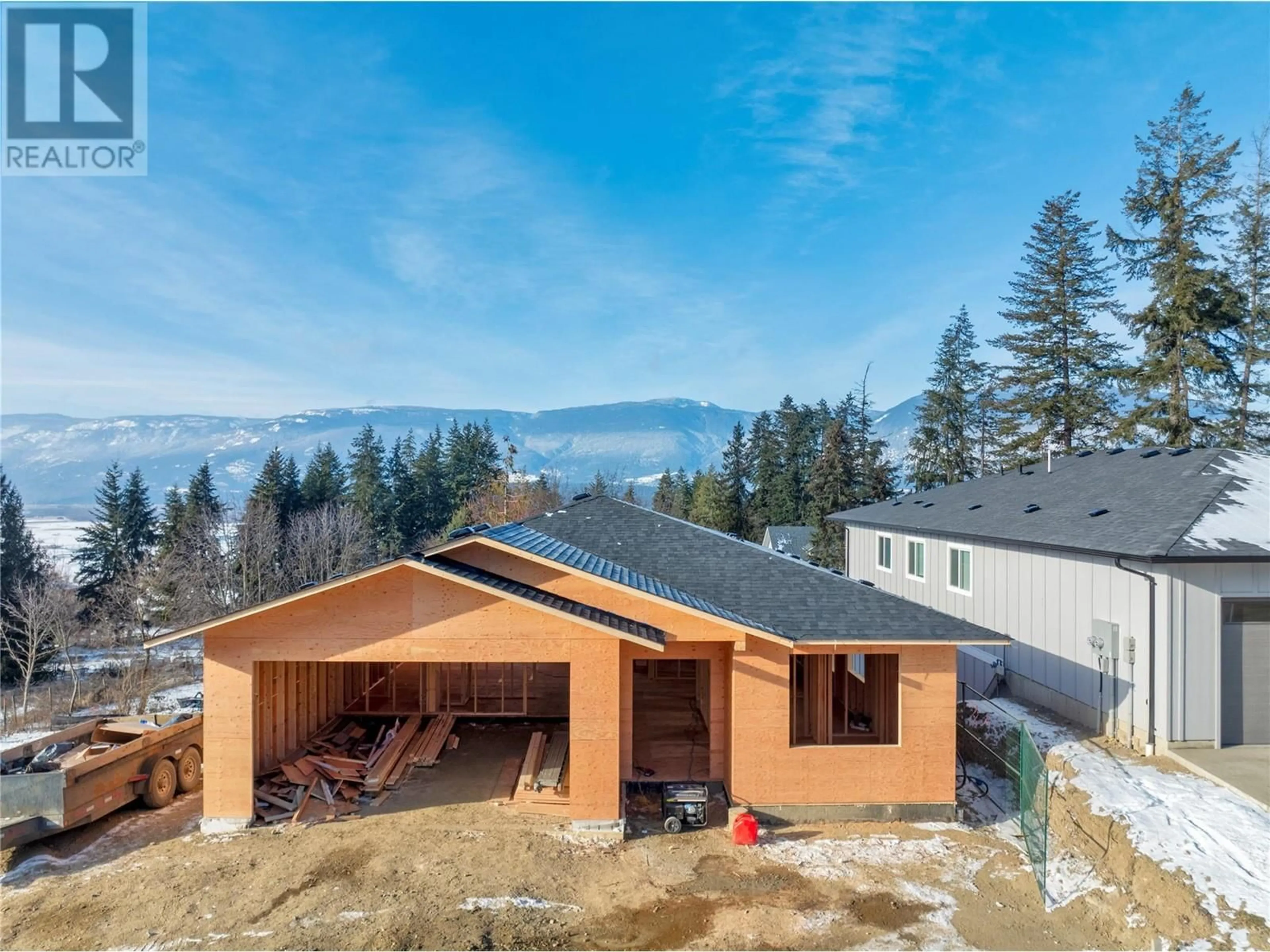 A pic from outside/outdoor area/front of a property/back of a property/a pic from drone, mountain view for 2971 27 Street NE, Salmon Arm British Columbia V1E2Z7