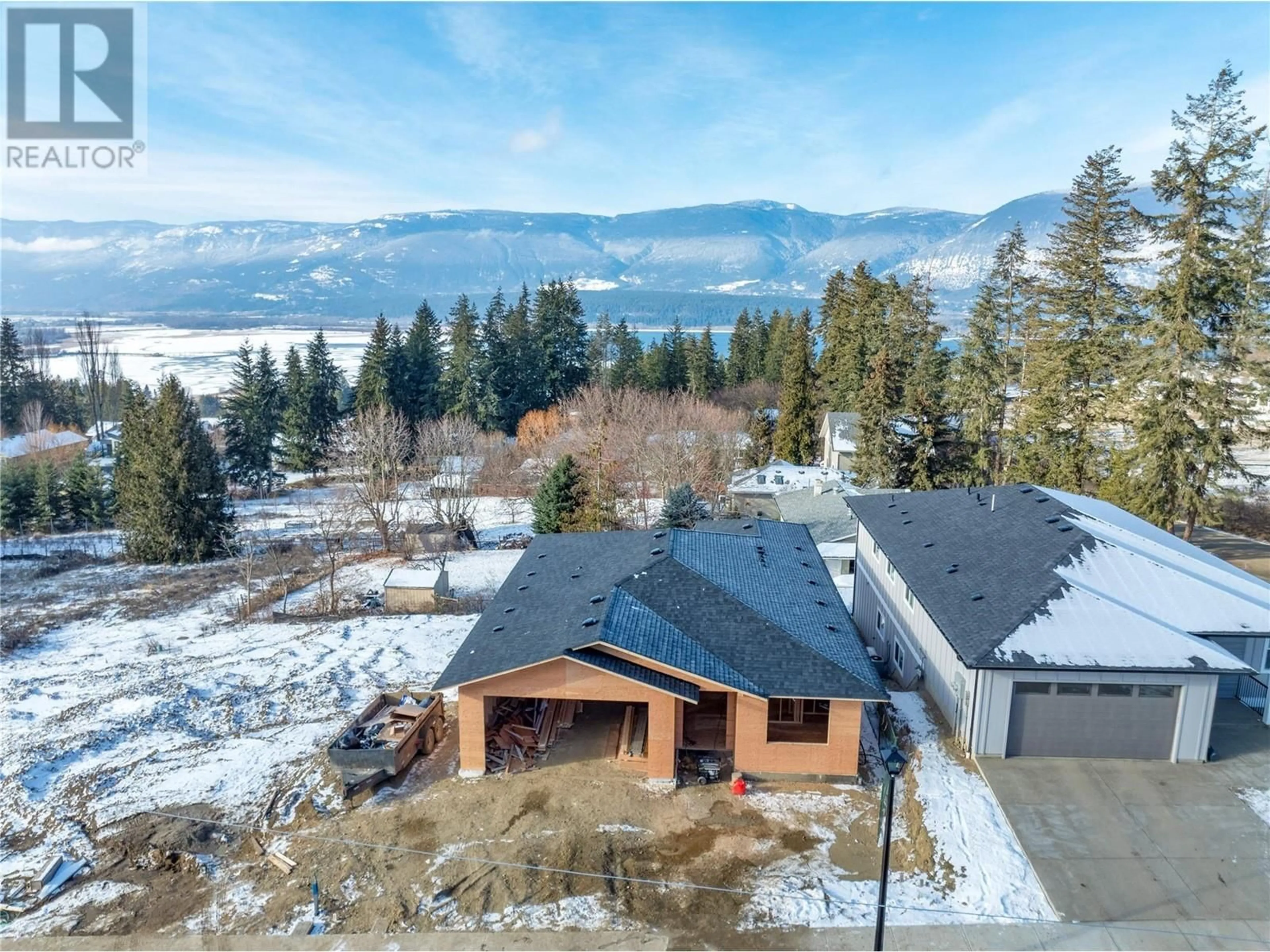 A pic from outside/outdoor area/front of a property/back of a property/a pic from drone, mountain view for 2971 27 Street NE, Salmon Arm British Columbia V1E2Z7