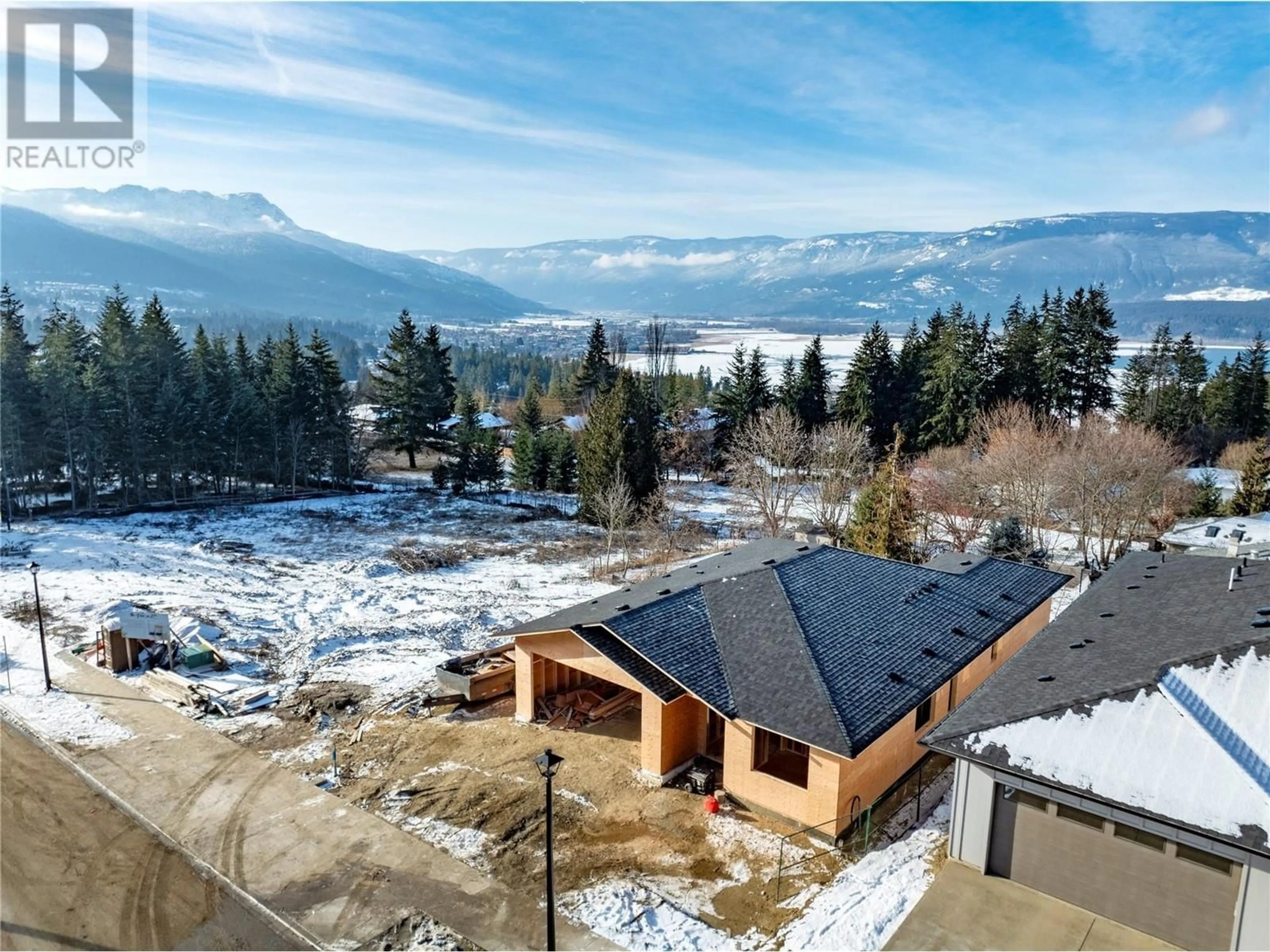 A pic from outside/outdoor area/front of a property/back of a property/a pic from drone, mountain view for 2971 27 Street NE, Salmon Arm British Columbia V1E2Z7