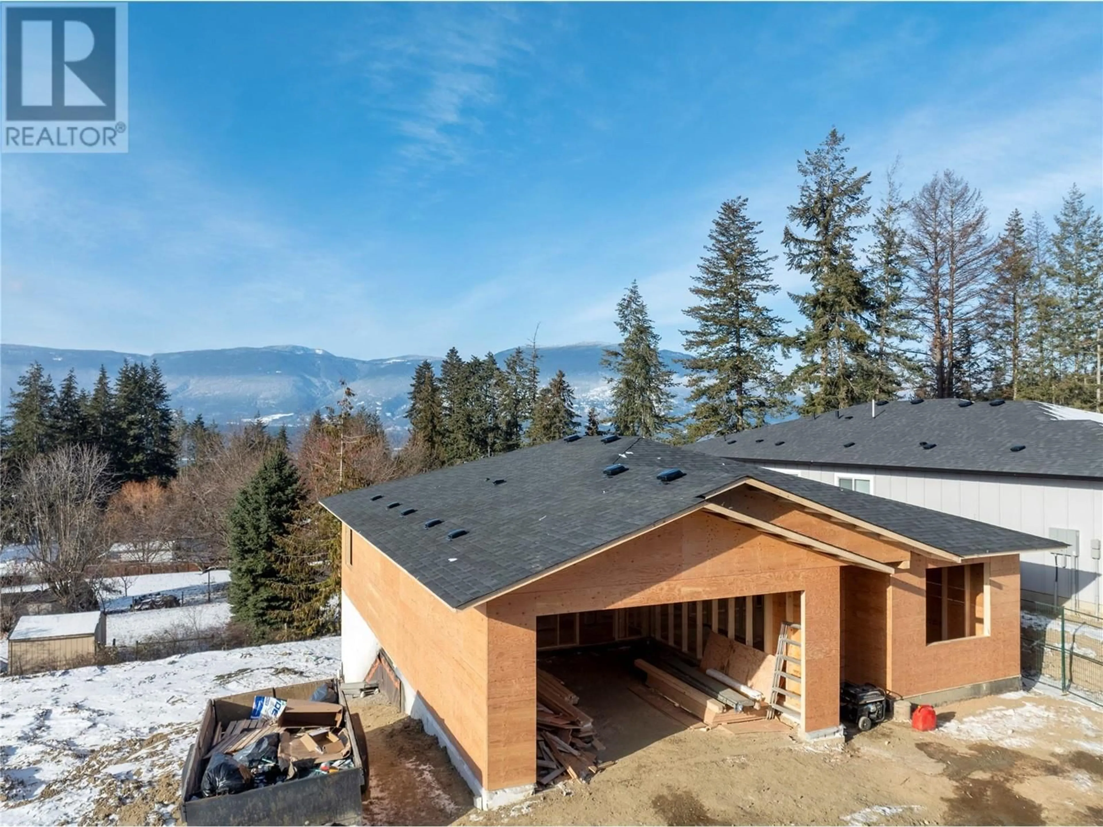 A pic from outside/outdoor area/front of a property/back of a property/a pic from drone, mountain view for 2971 27 Street NE, Salmon Arm British Columbia V1E2Z7