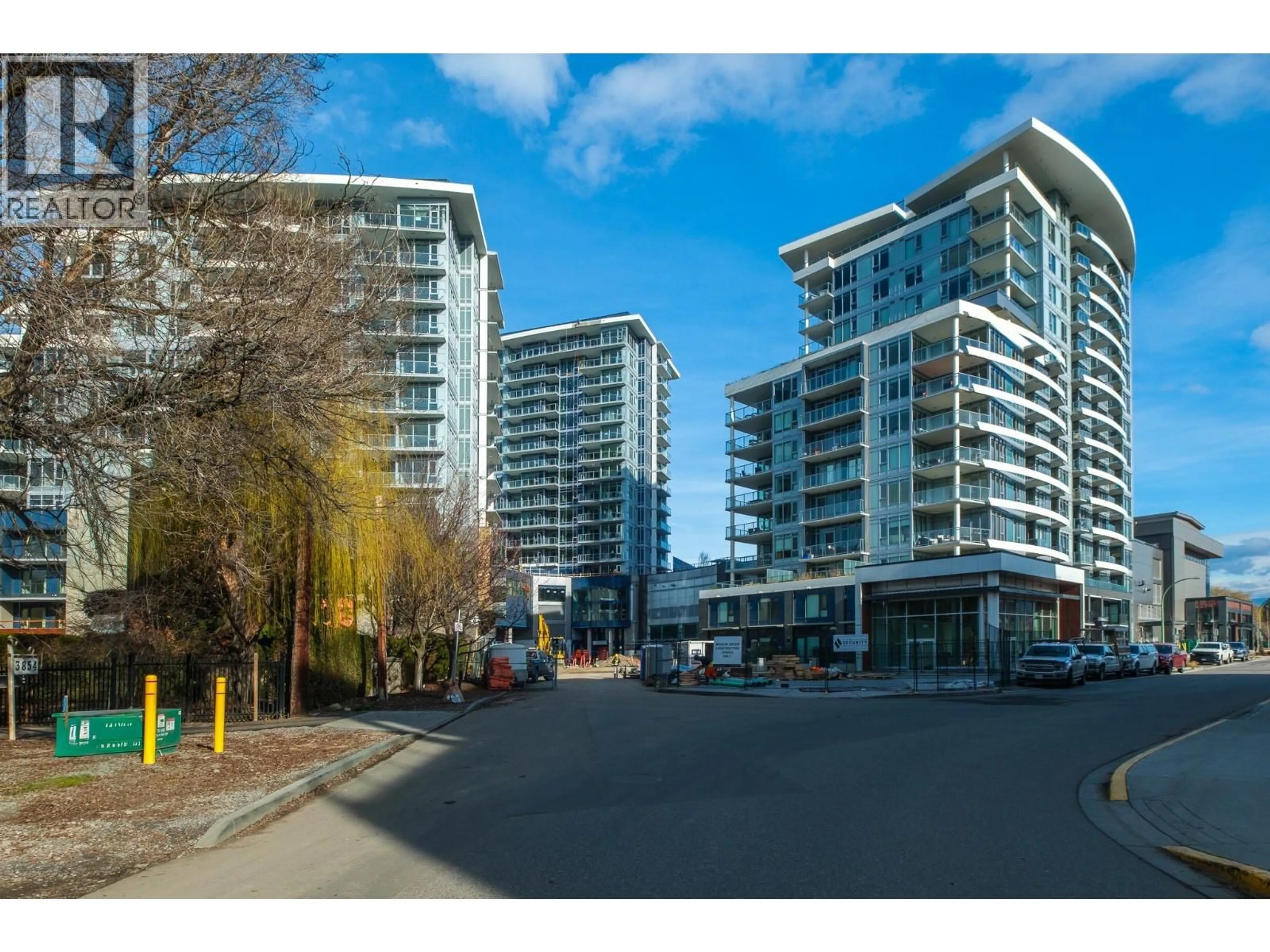 A pic from outside/outdoor area/front of a property/back of a property/a pic from drone, street for 401 - 3699 CAPOZZI ROAD, Kelowna British Columbia V1W0G3