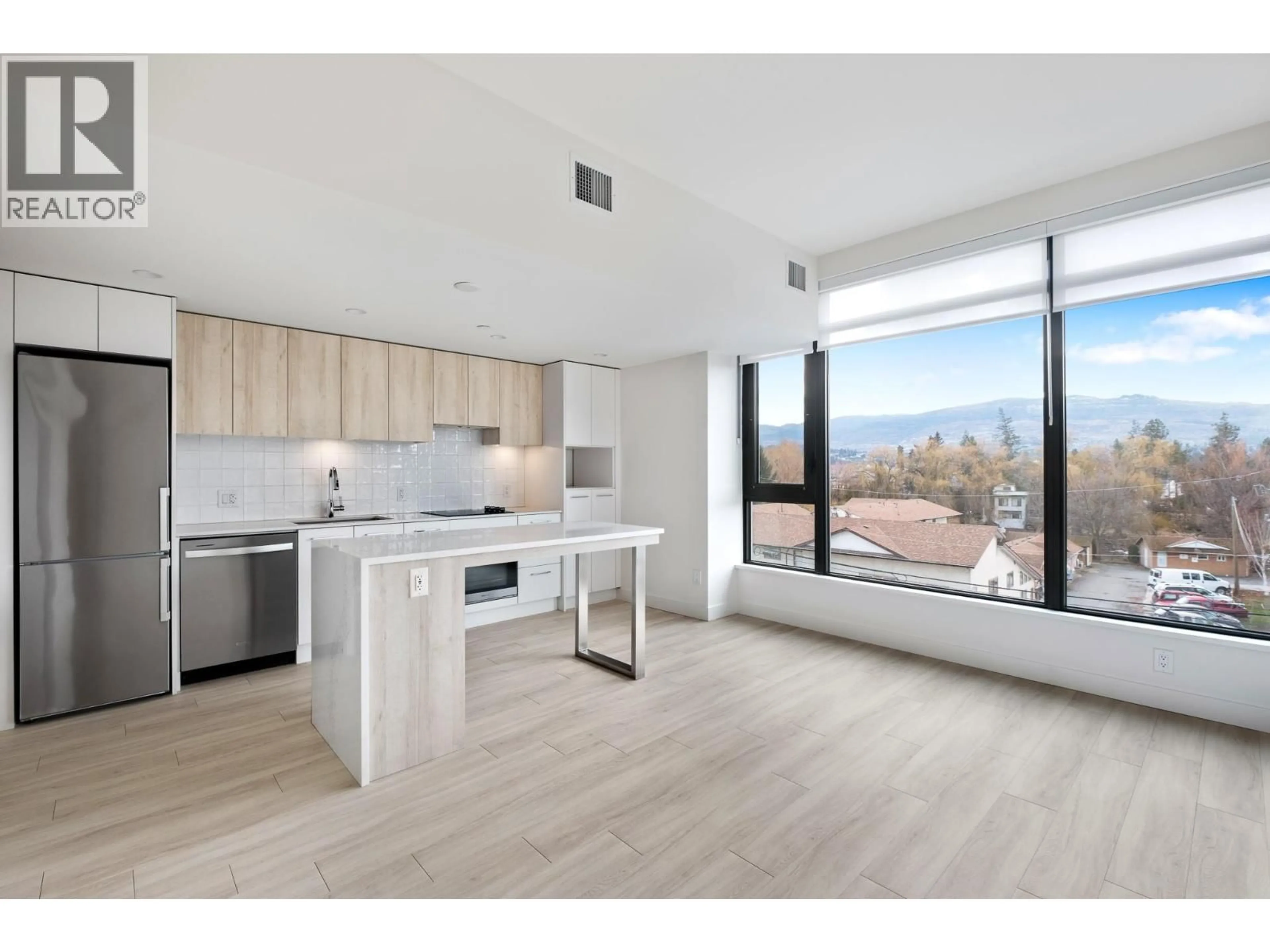Open concept kitchen, unknown for 401 - 3699 CAPOZZI ROAD, Kelowna British Columbia V1W0G3