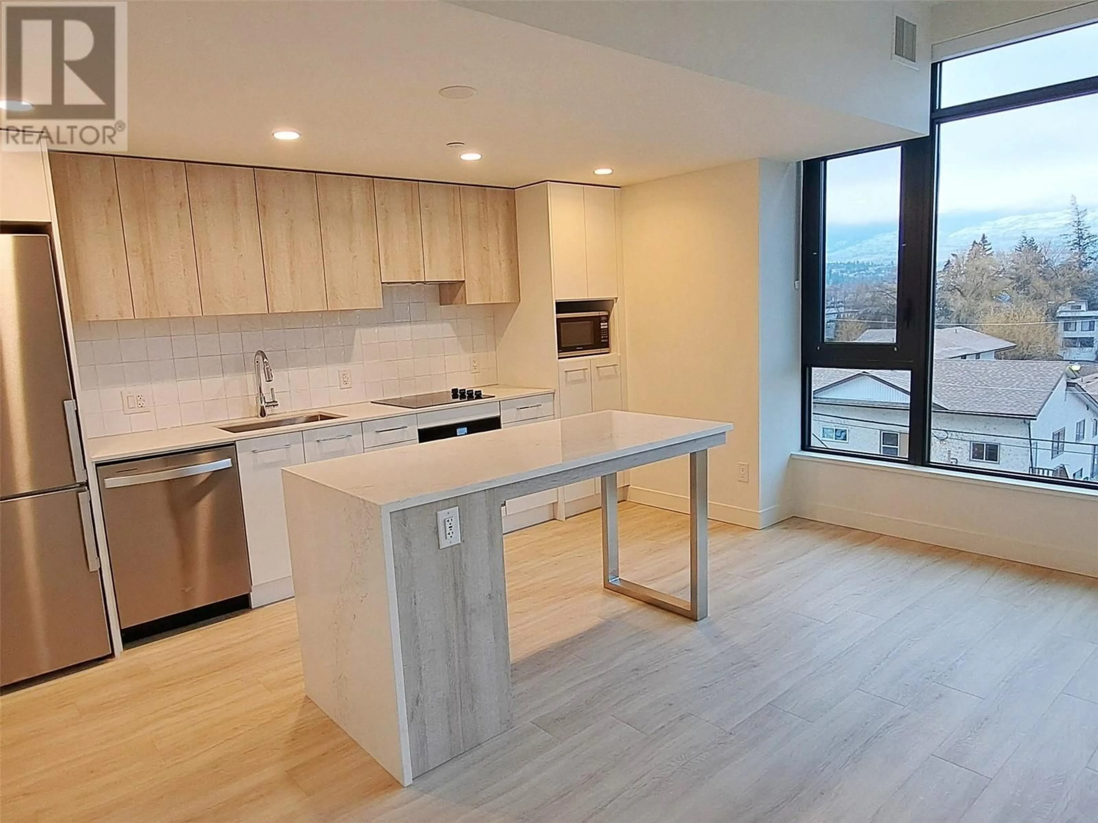 Open concept kitchen, unknown for 401 - 3699 CAPOZZI ROAD, Kelowna British Columbia V1W0G3