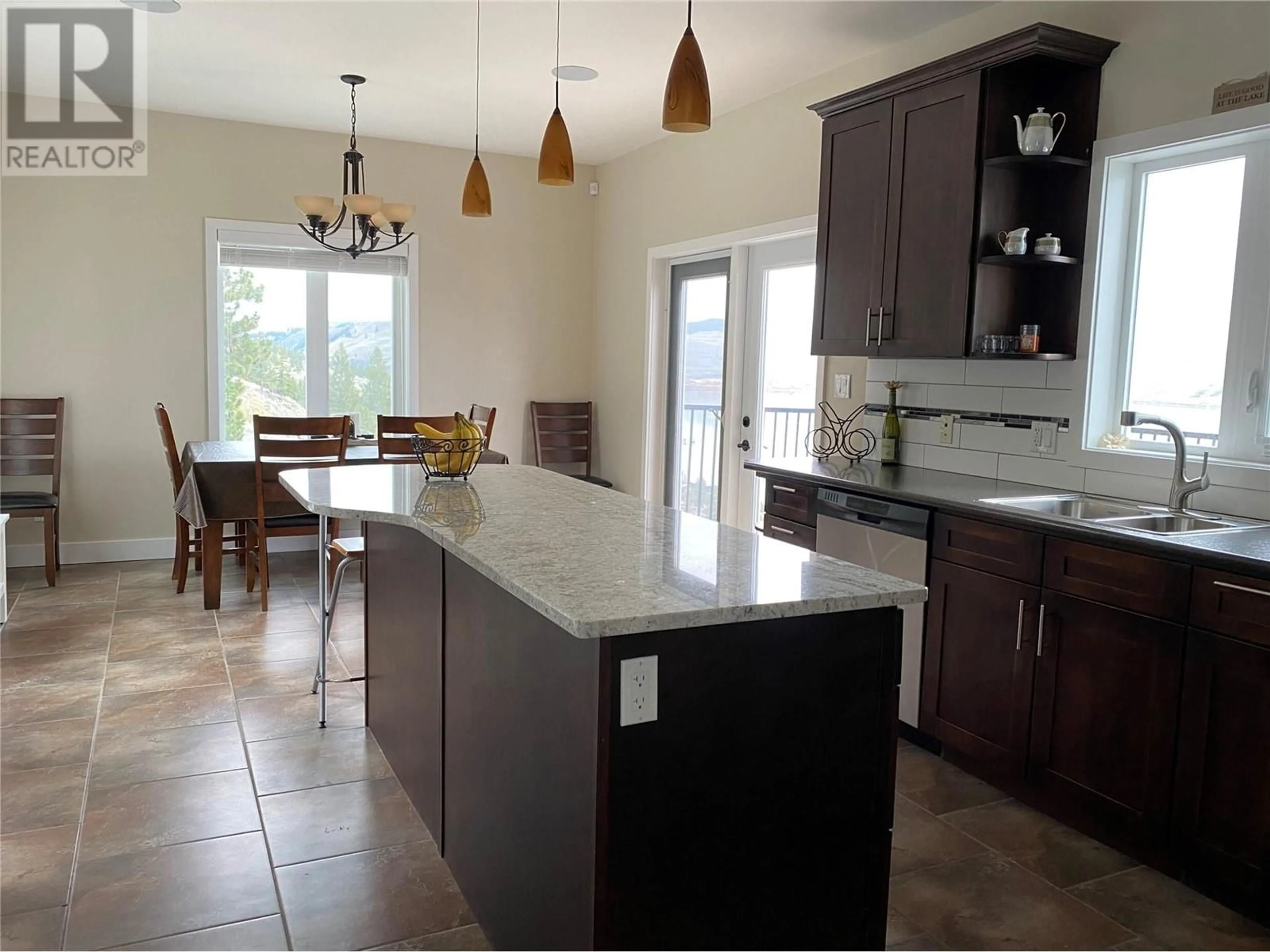 Open concept kitchen, ceramic/tile floor for 6441 JAGPAL WAY, Merritt British Columbia V0E2R0