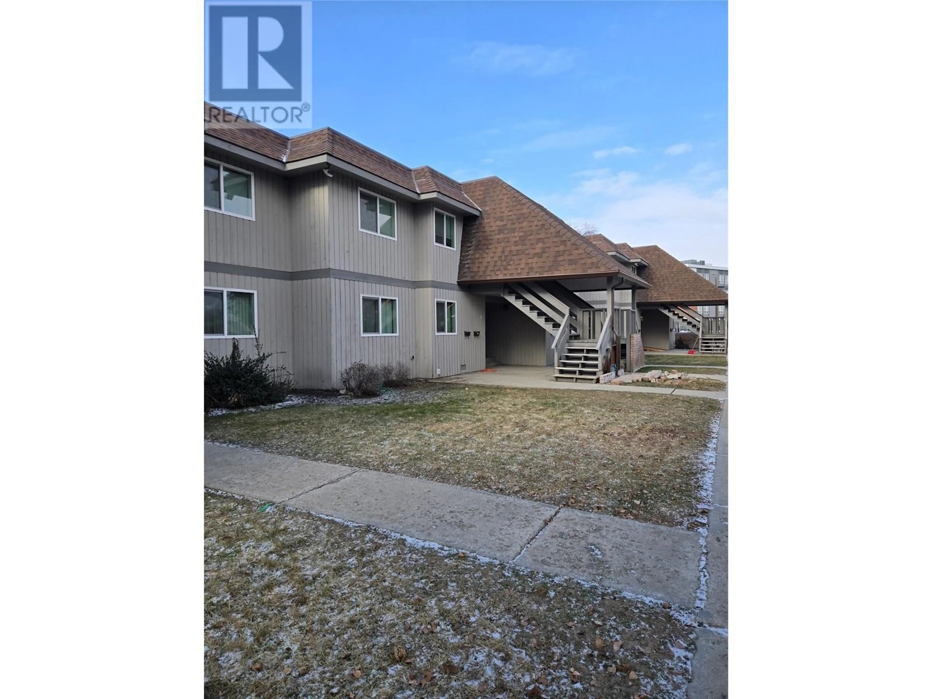 A pic from outside/outdoor area/front of a property/back of a property/a pic from drone, unknown for 340 Mills Road Unit# 10, Kelowna British Columbia V1X4G8