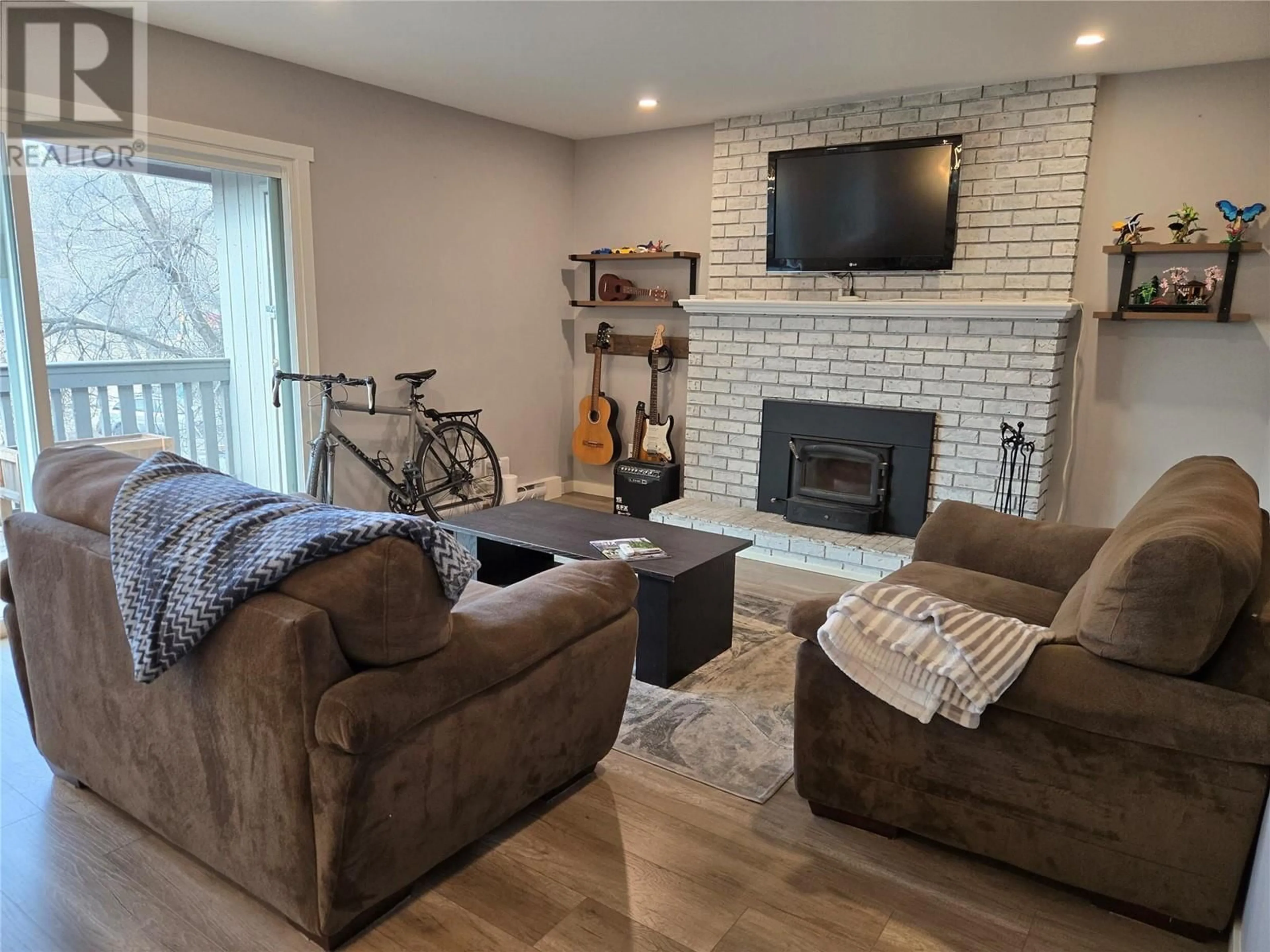 Living room with furniture, unknown for 340 Mills Road Unit# 10, Kelowna British Columbia V1X4G8