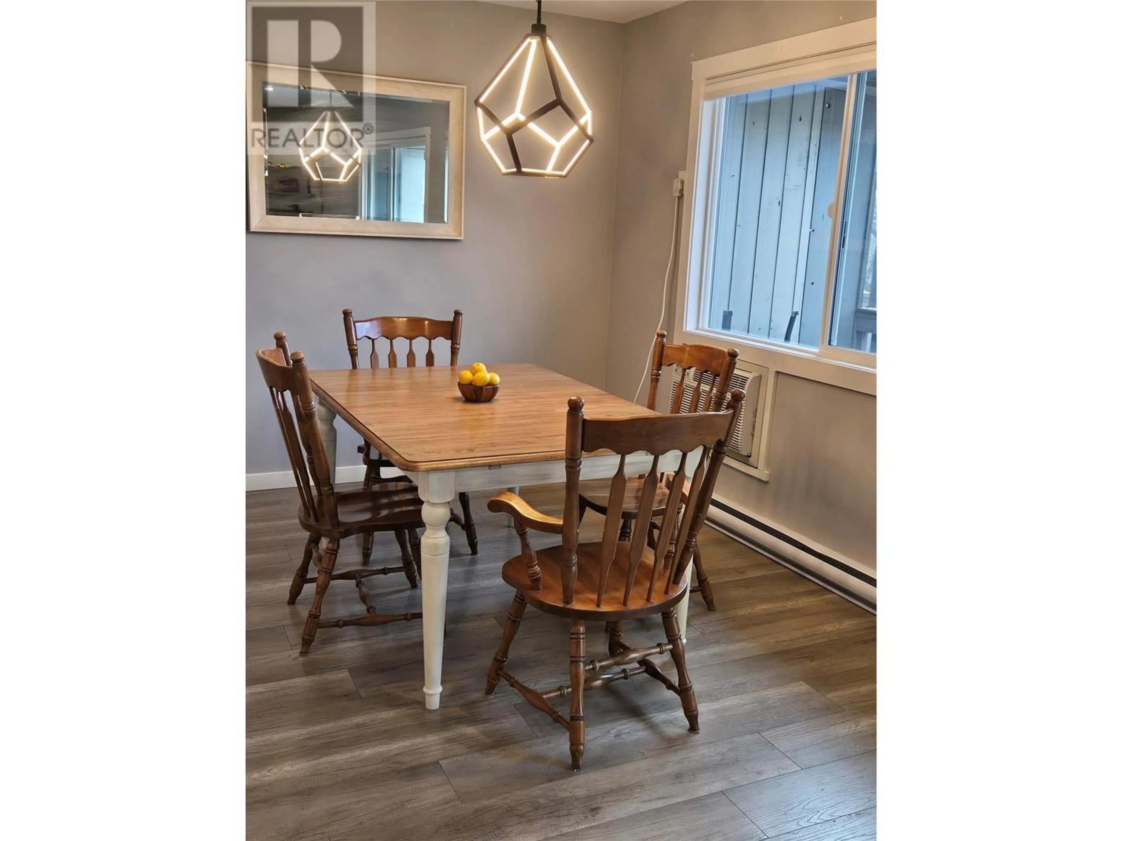 Dining room, wood/laminate floor for 340 Mills Road Unit# 10, Kelowna British Columbia V1X4G8