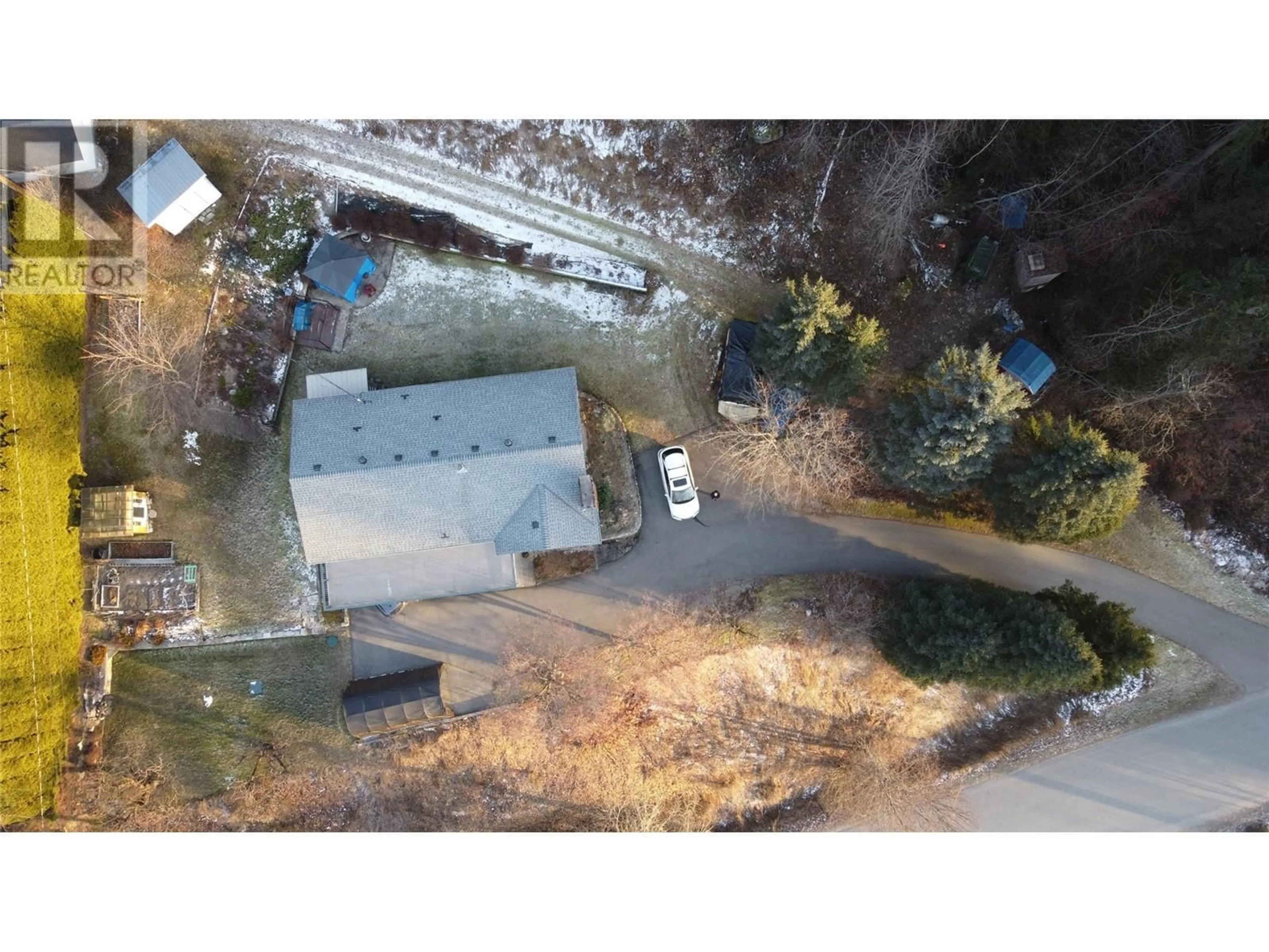 A pic from outside/outdoor area/front of a property/back of a property/a pic from drone, street for 2070 Bealby Road, Nelson British Columbia V1L3E2