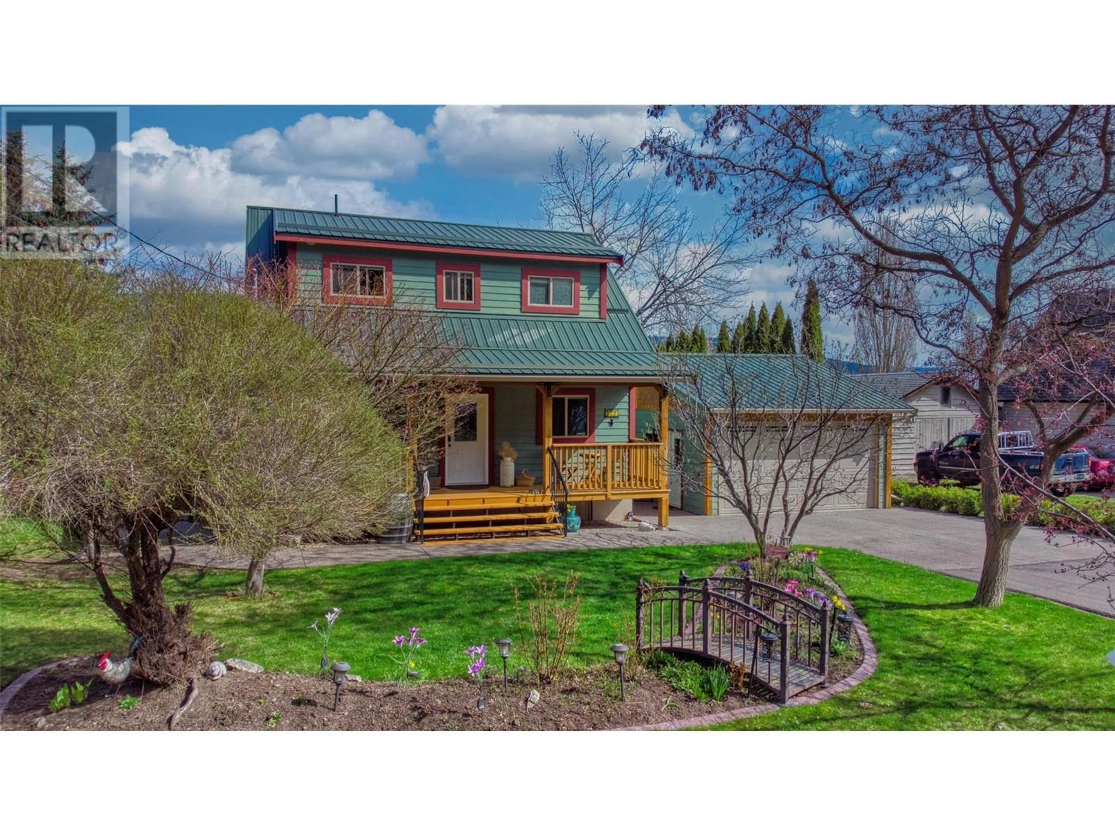 A pic from outside/outdoor area/front of a property/back of a property/a pic from drone, street for 7331 FINTRY DELTA ROAD, Kelowna British Columbia V1Z3R8
