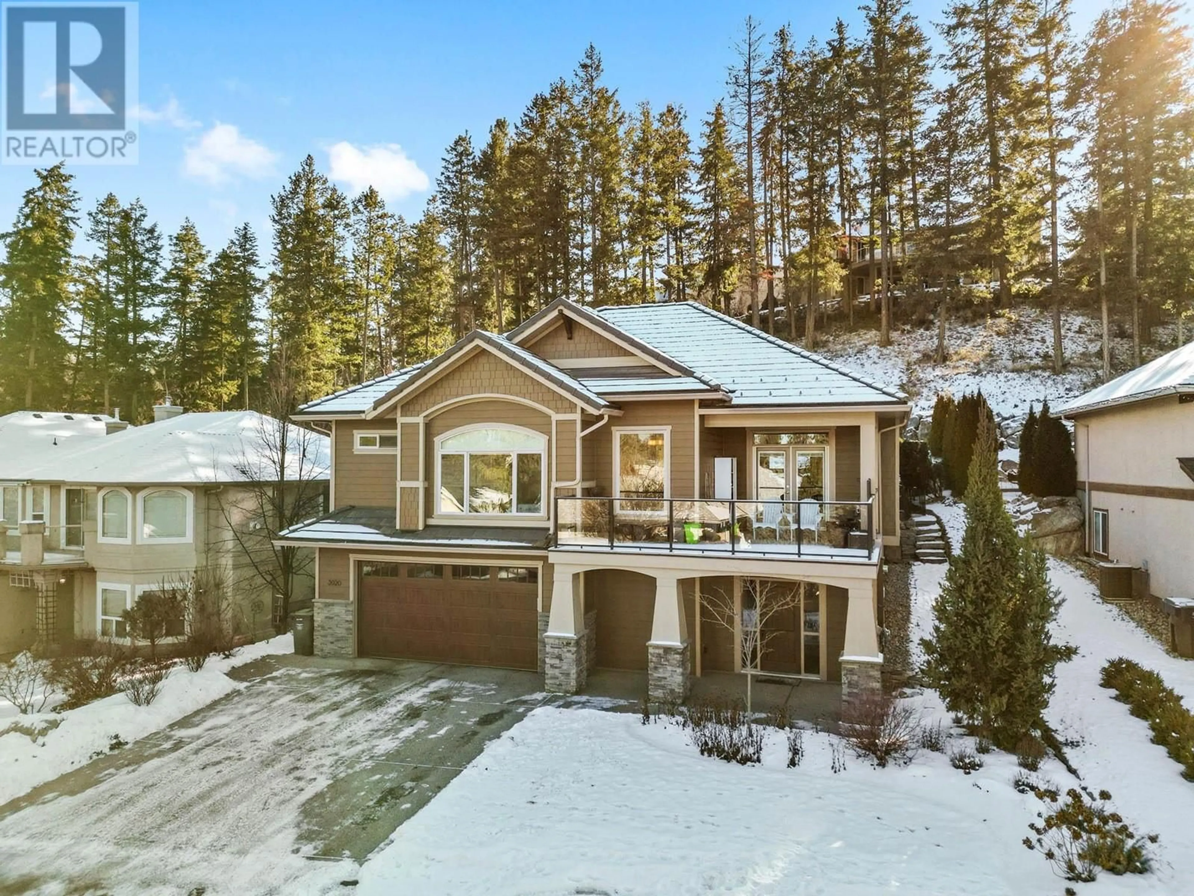 A pic from outside/outdoor area/front of a property/back of a property/a pic from drone, unknown for 3920 Gallaghers Circle, Kelowna British Columbia V1W3Z9