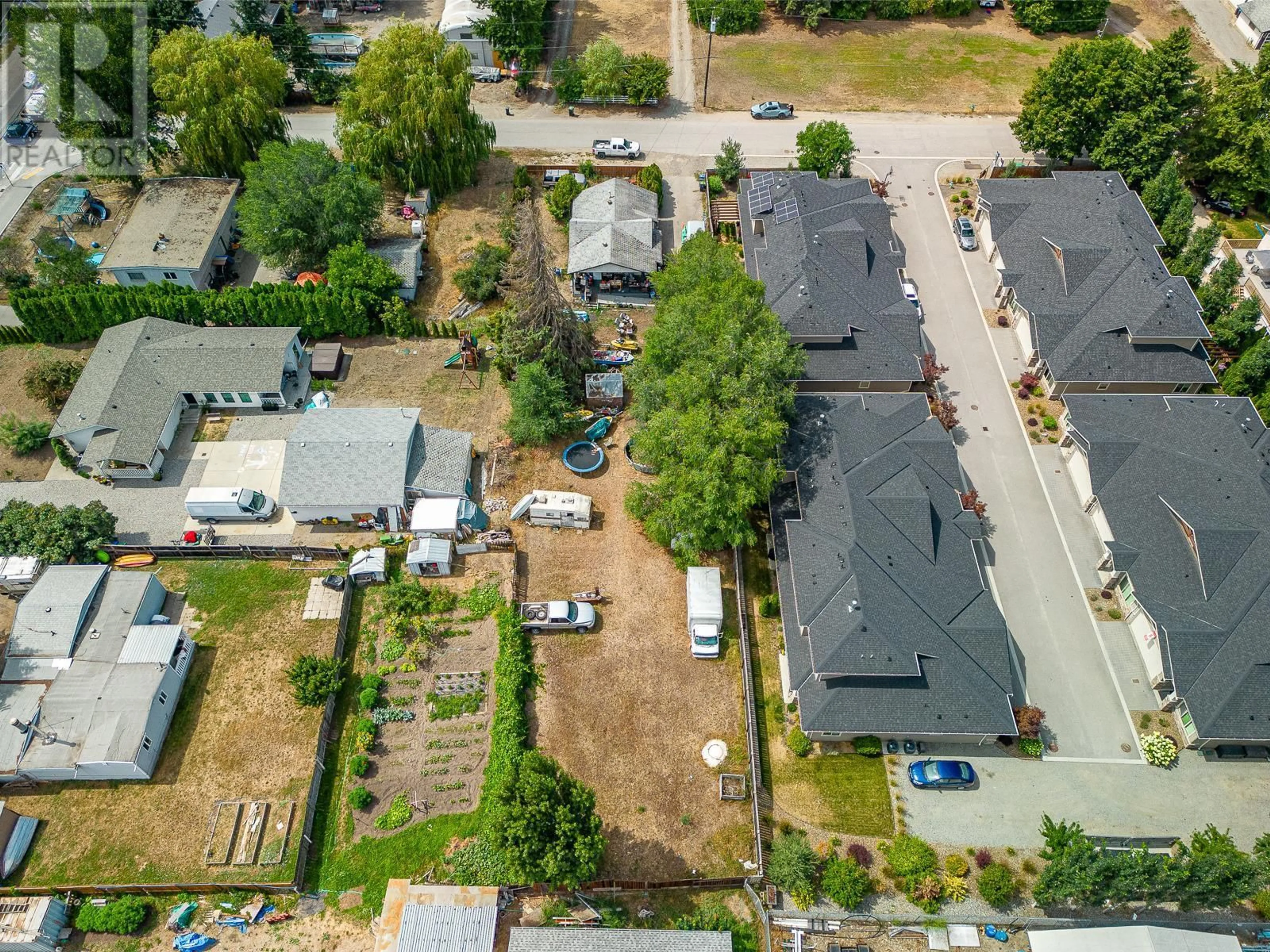 A pic from outside/outdoor area/front of a property/back of a property/a pic from drone, street for 3310 BEAVER LAKE ROAD, Lake Country British Columbia V4V1S6