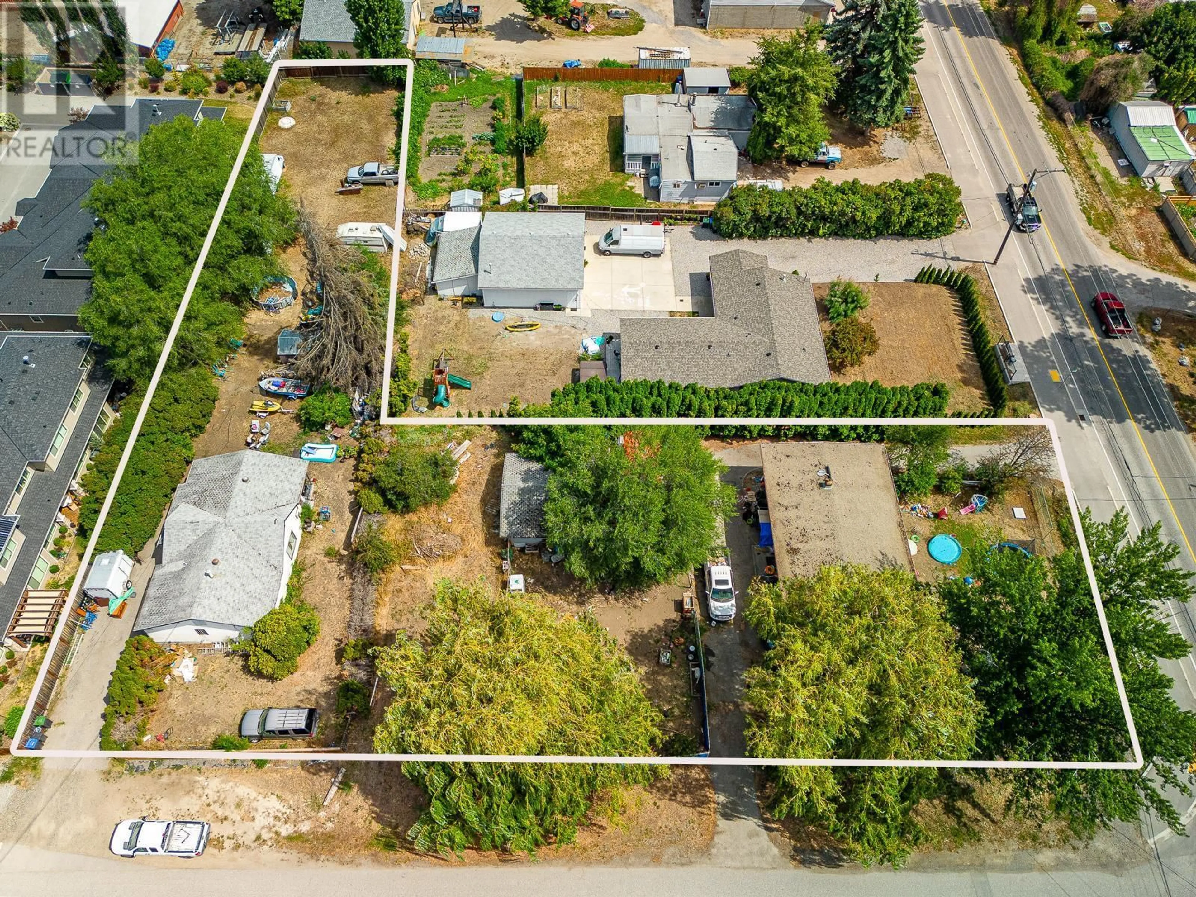 A pic from outside/outdoor area/front of a property/back of a property/a pic from drone, street for 3310 Beaver Lake Road, Lake Country British Columbia V4V1S6