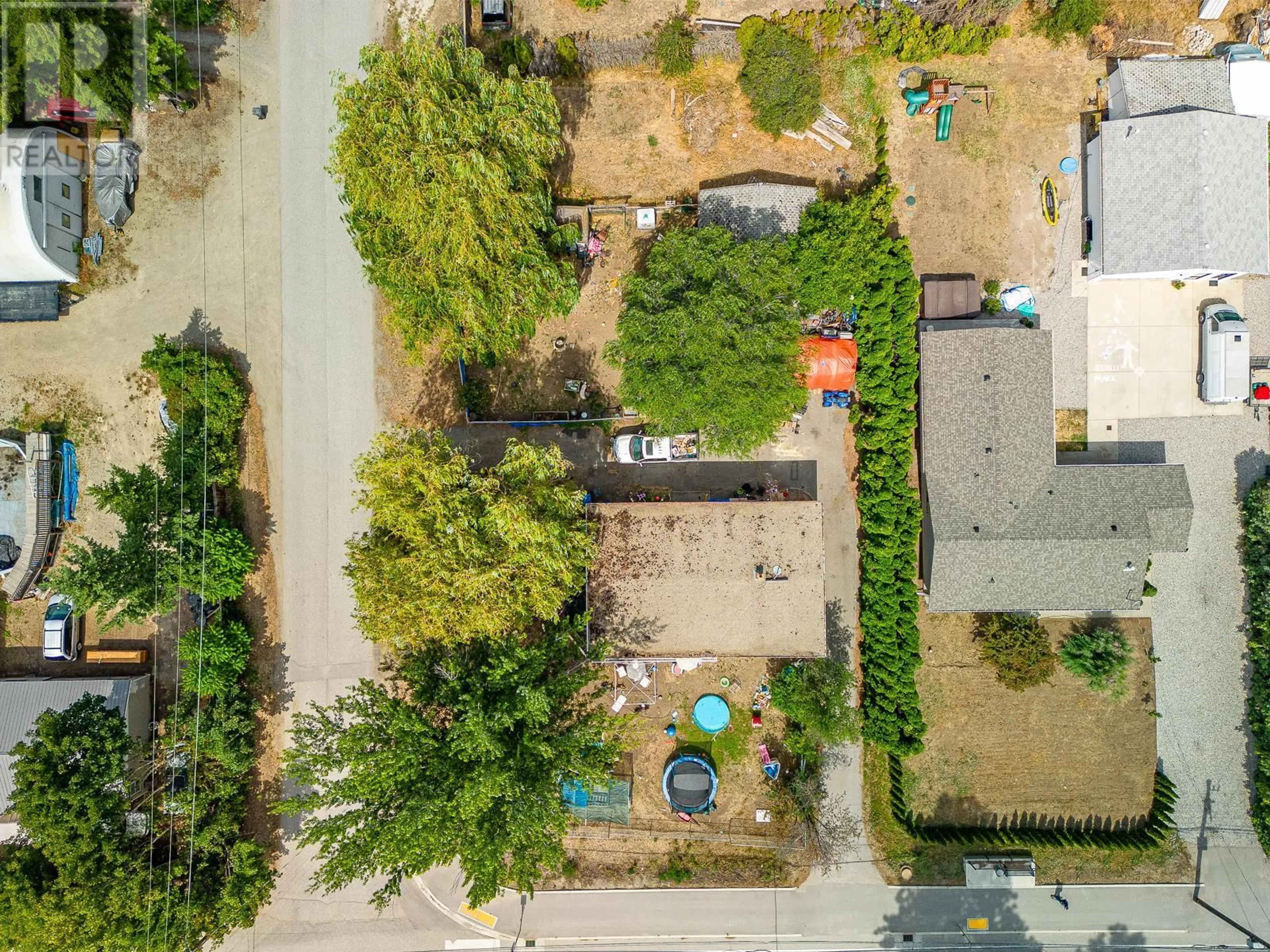 A pic from outside/outdoor area/front of a property/back of a property/a pic from drone, street for 3310 Beaver Lake Road, Lake Country British Columbia V4V1S6