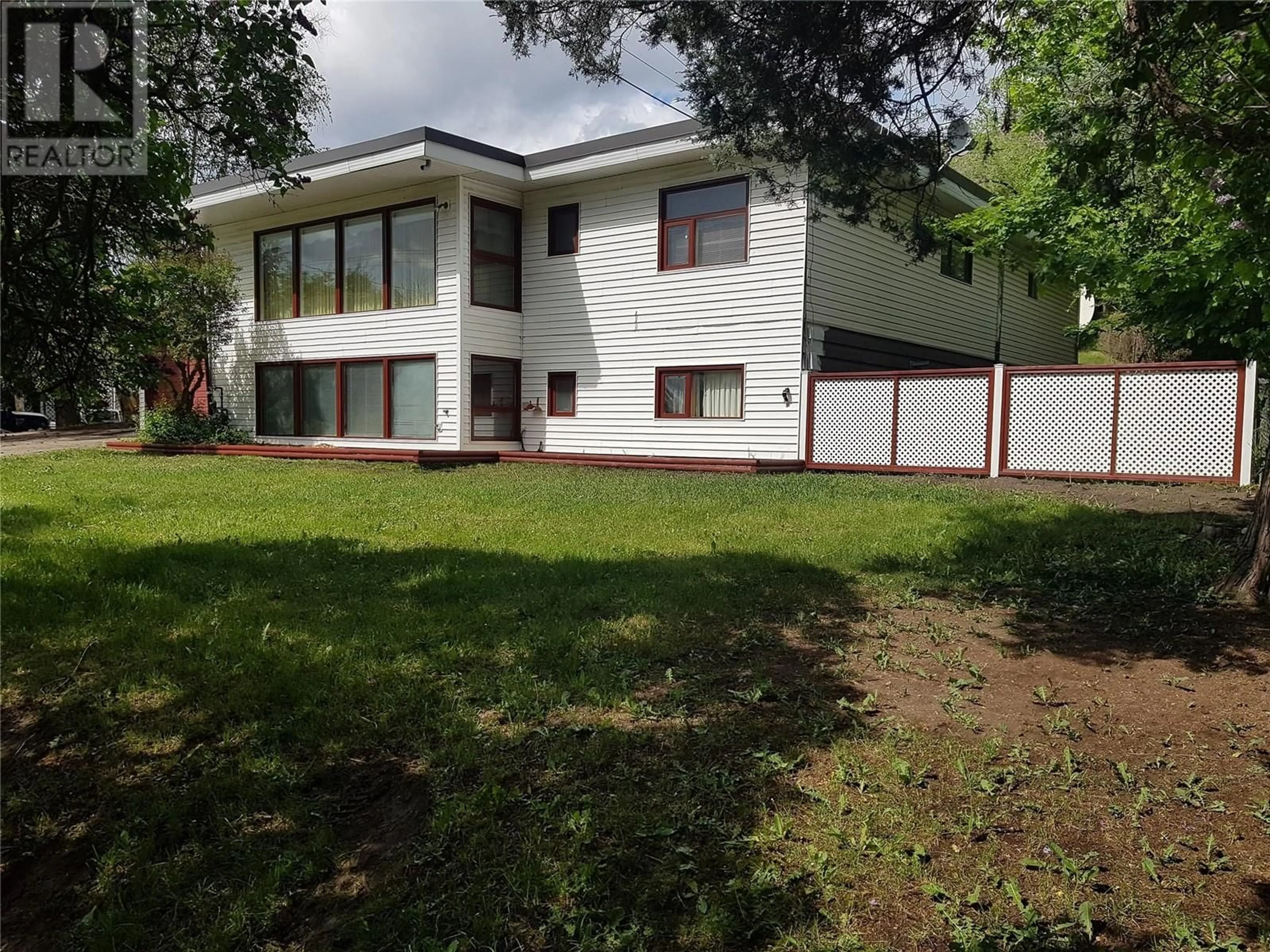 A pic from outside/outdoor area/front of a property/back of a property/a pic from drone, unknown for 11503 KALAMALKA ROAD, Vernon British Columbia V1B1M2