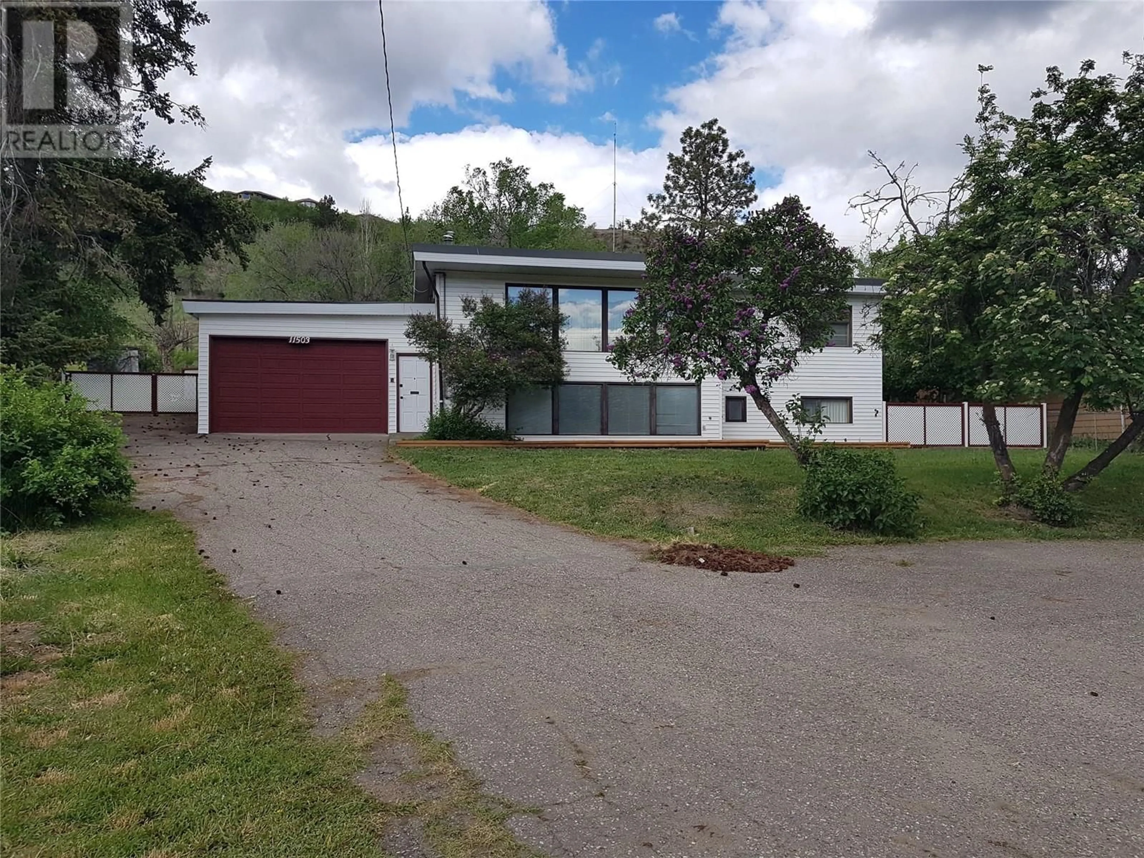 A pic from outside/outdoor area/front of a property/back of a property/a pic from drone, unknown for 11503 KALAMALKA ROAD, Vernon British Columbia V1B1M2